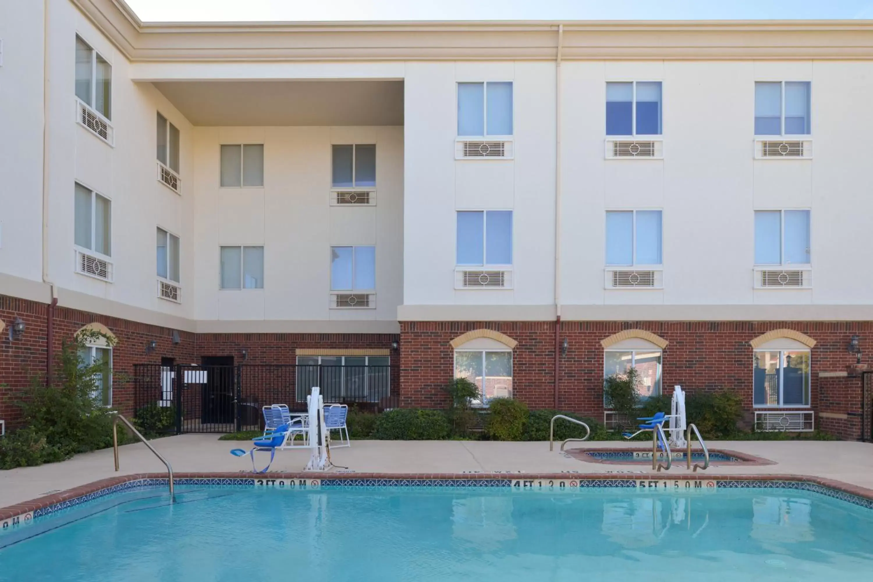 Swimming Pool in Holiday Inn Express Hotel & Suites Abilene Mall South, an IHG Hotel