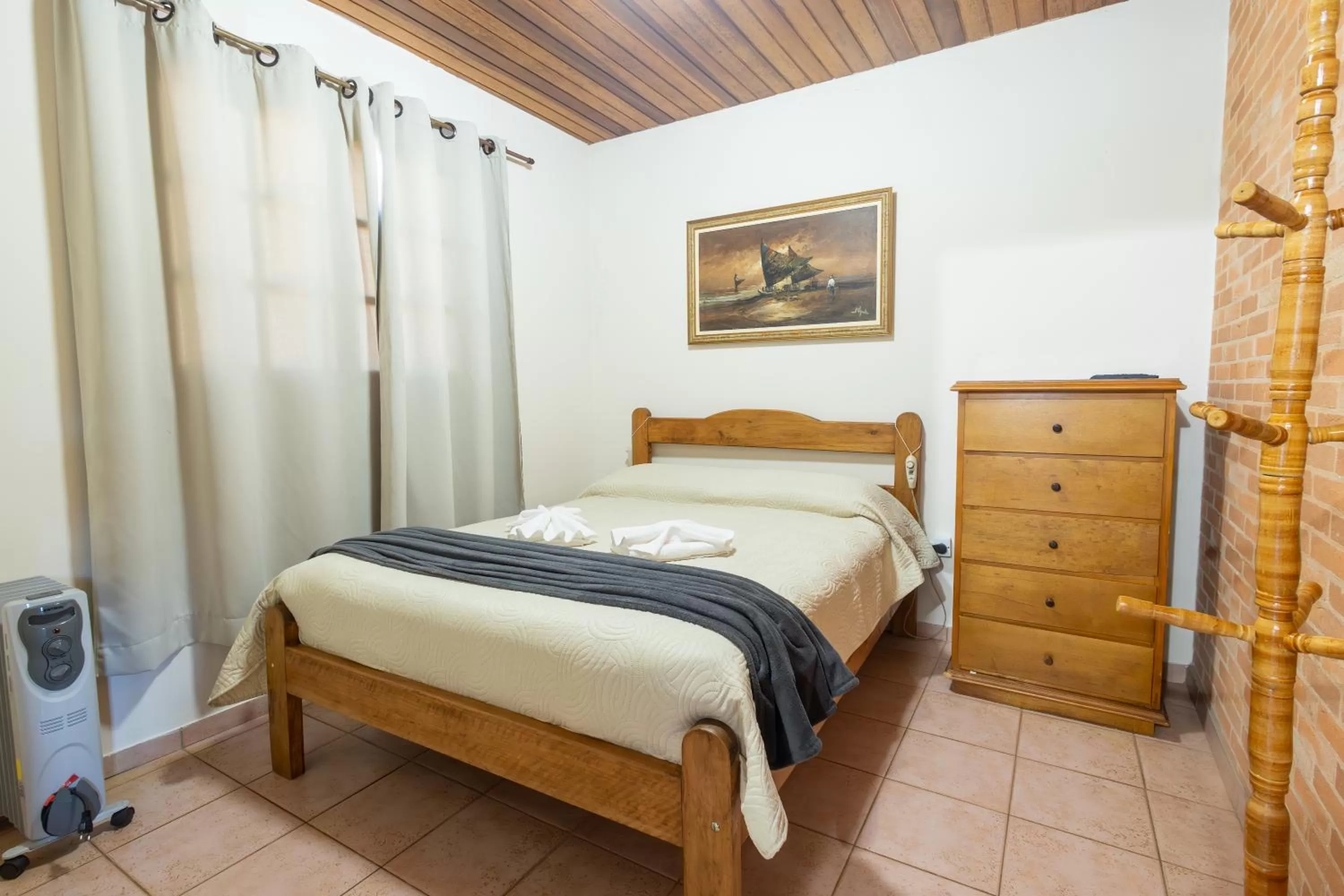 Bed in Pousada 3 Pinheiros