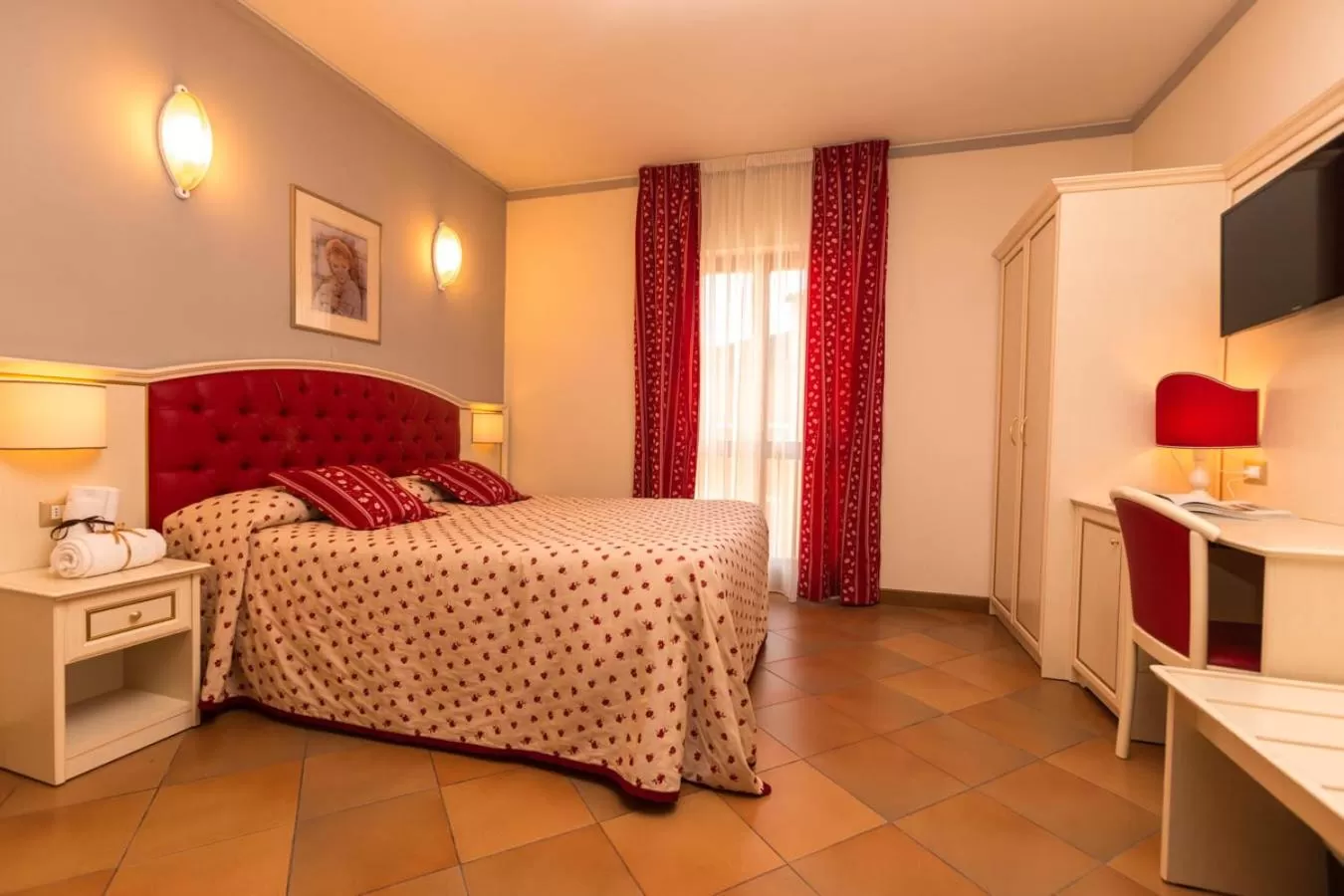 Bed in Hotel Le Mura