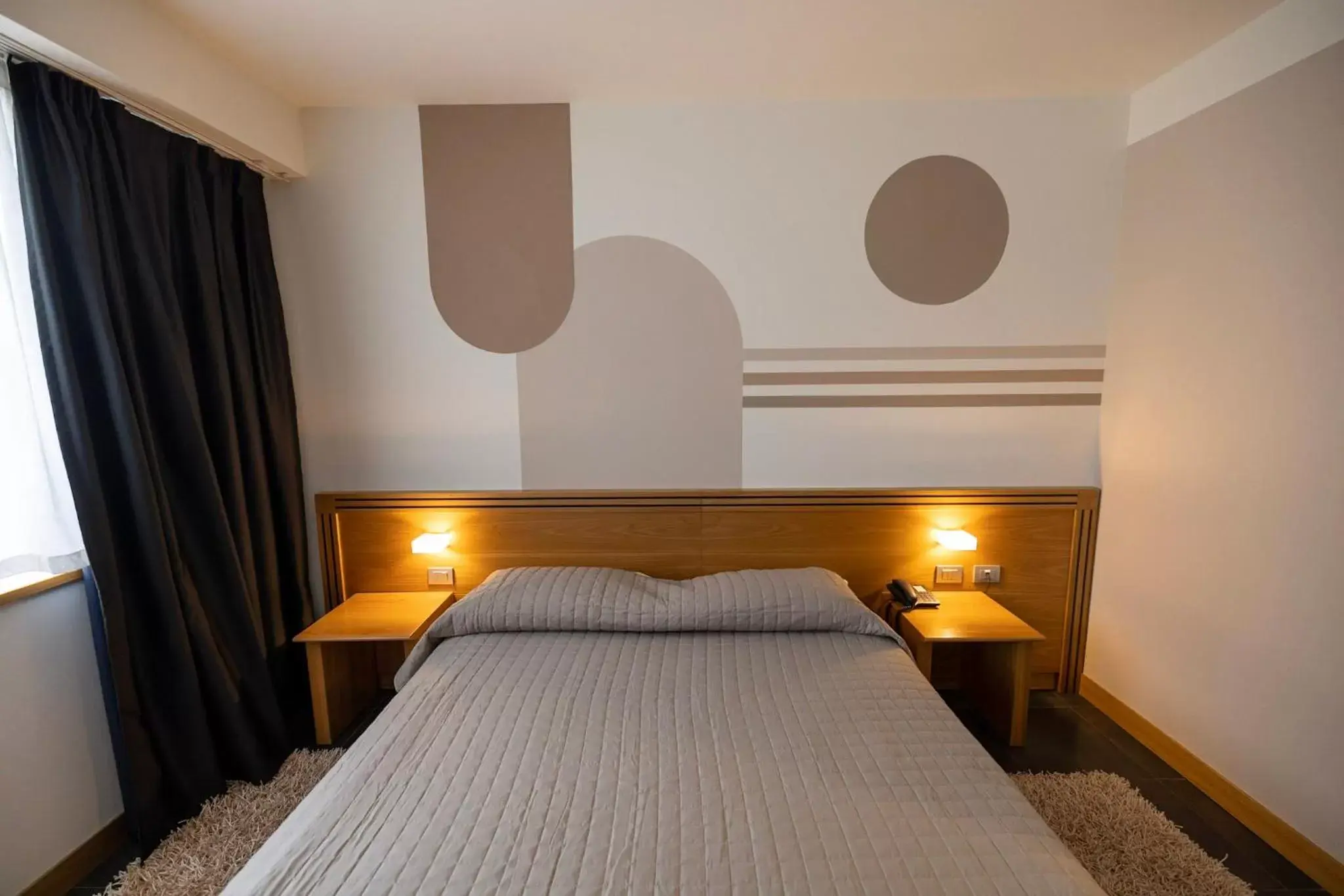 Bed in Hotel Europa Belluno
