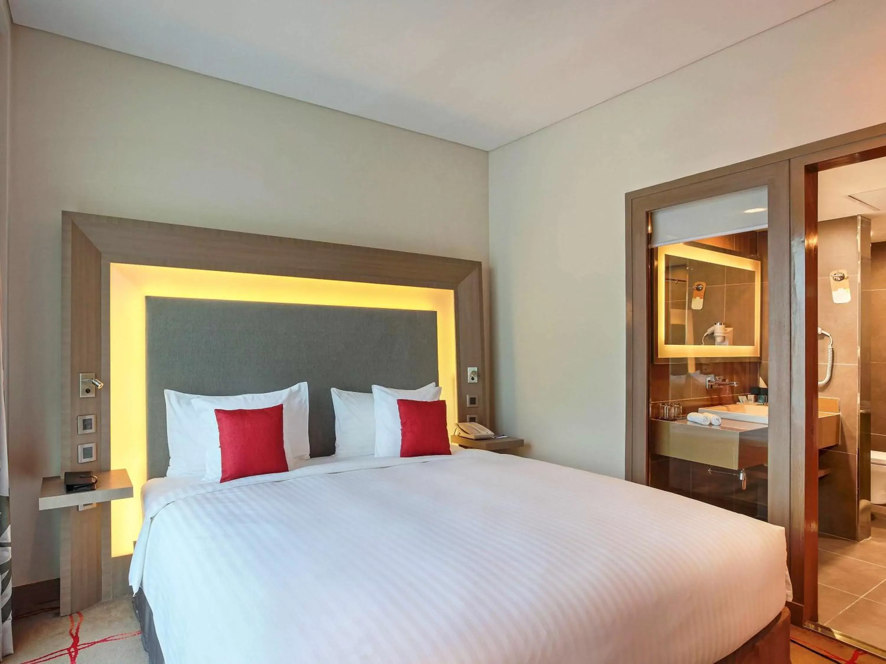 Photo of the whole room, Bed in Novotel Ahmedabad