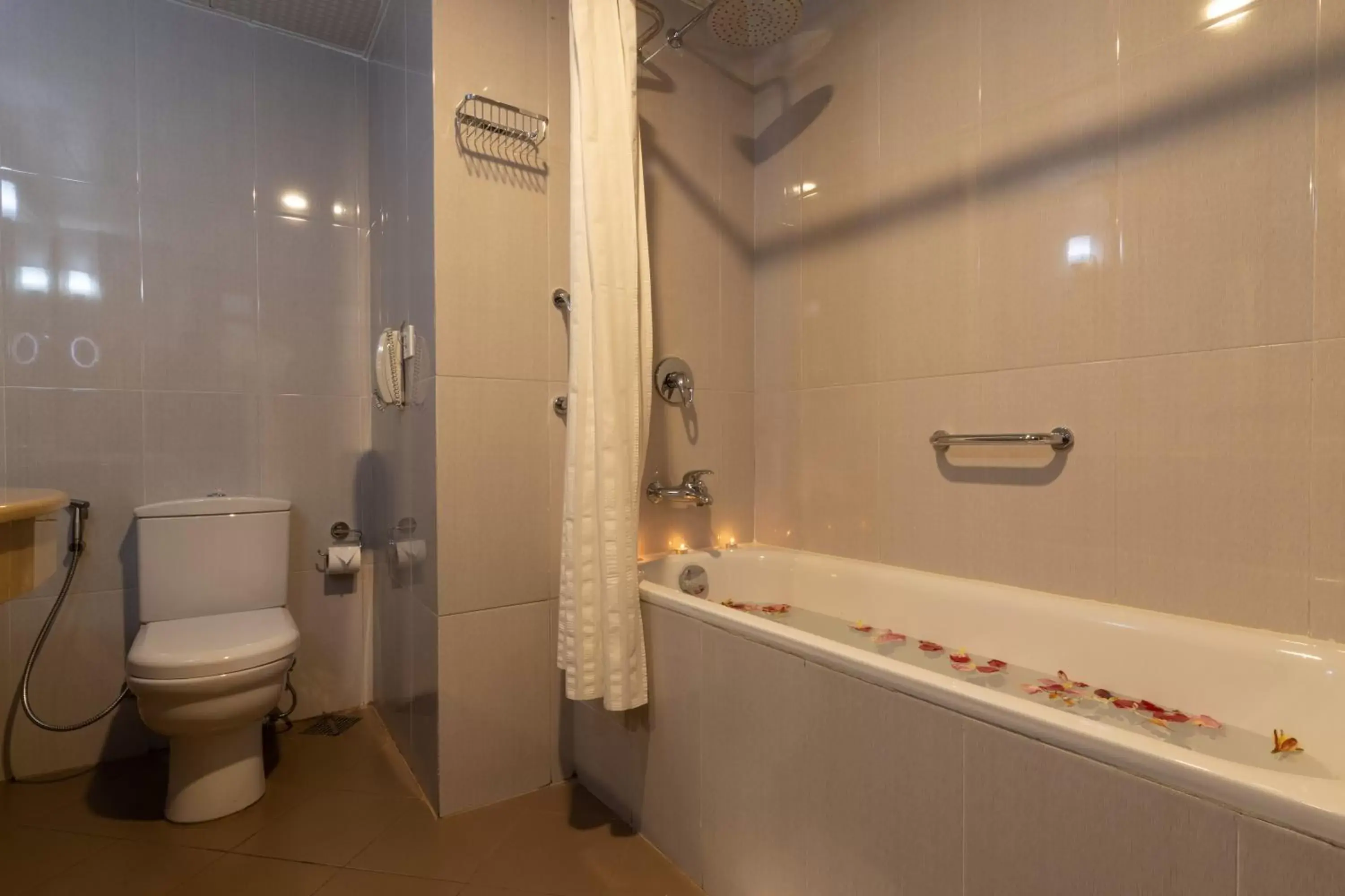 Bathroom in Araliya Green Hills Hotel