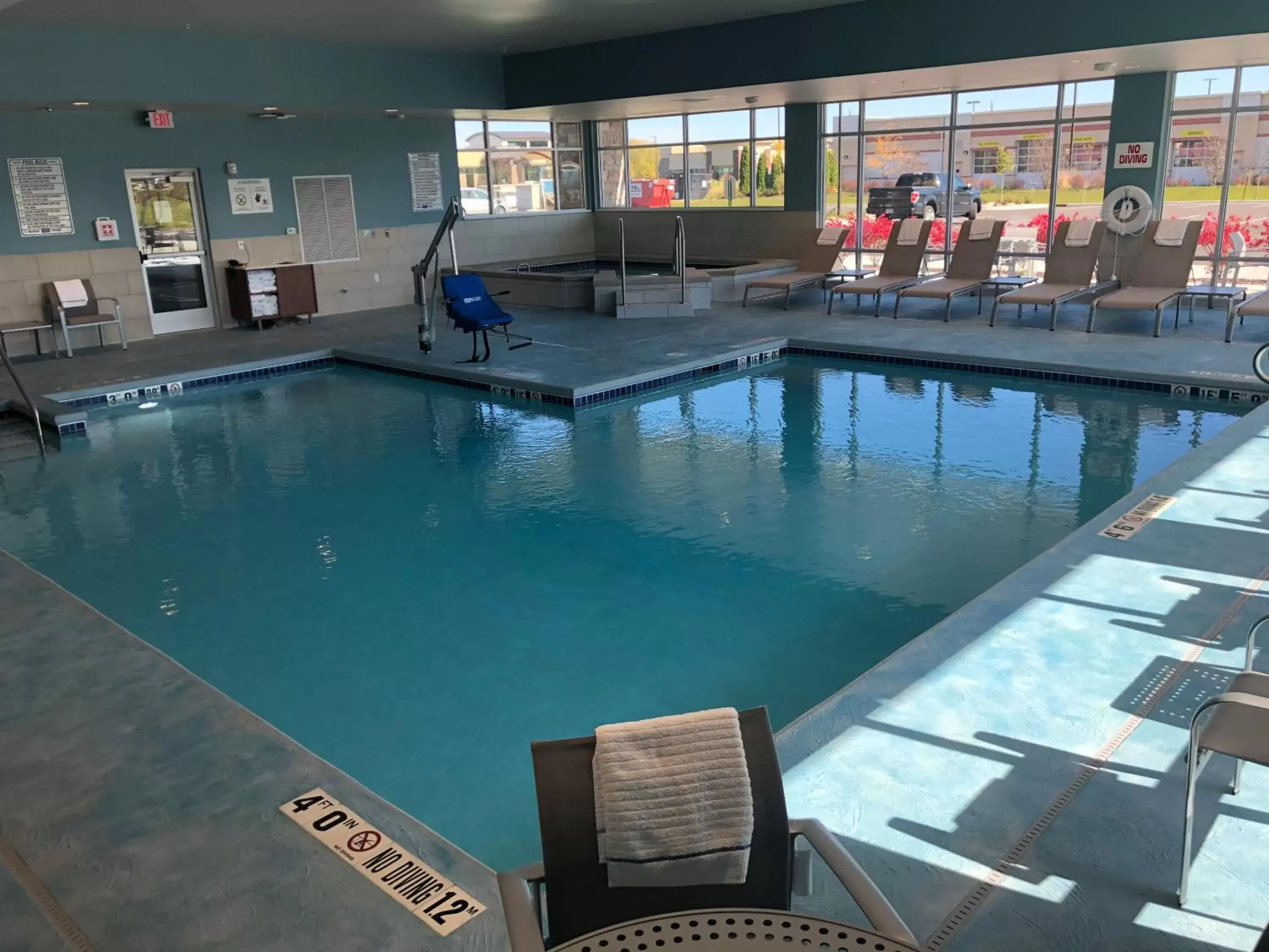 Swimming pool in Holiday Inn Express & Suites - Madison West - Middleton, an IHG Hotel