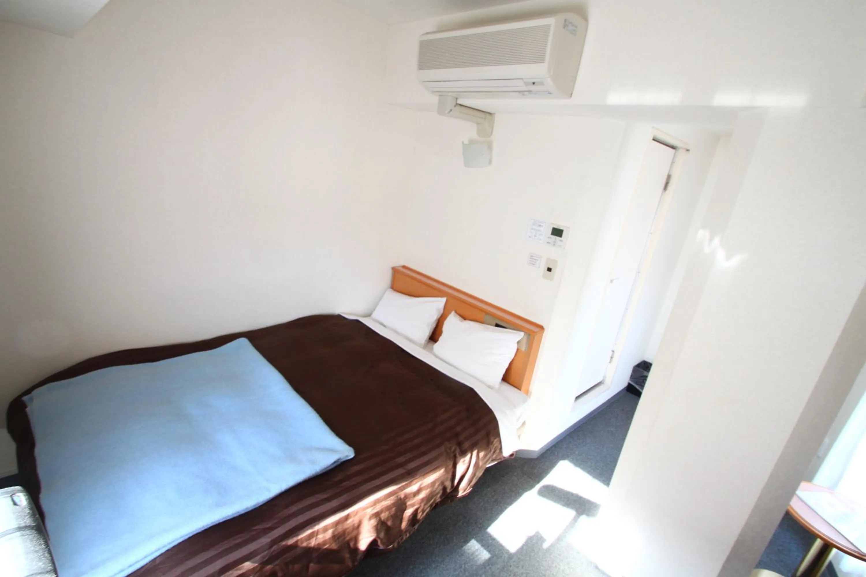 Bed in Sakura Hotel Hatagaya