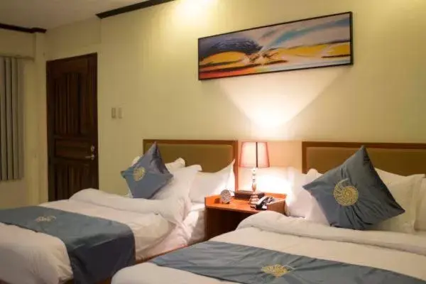 Photo of the whole room, Bed in Costa Palawan Resort