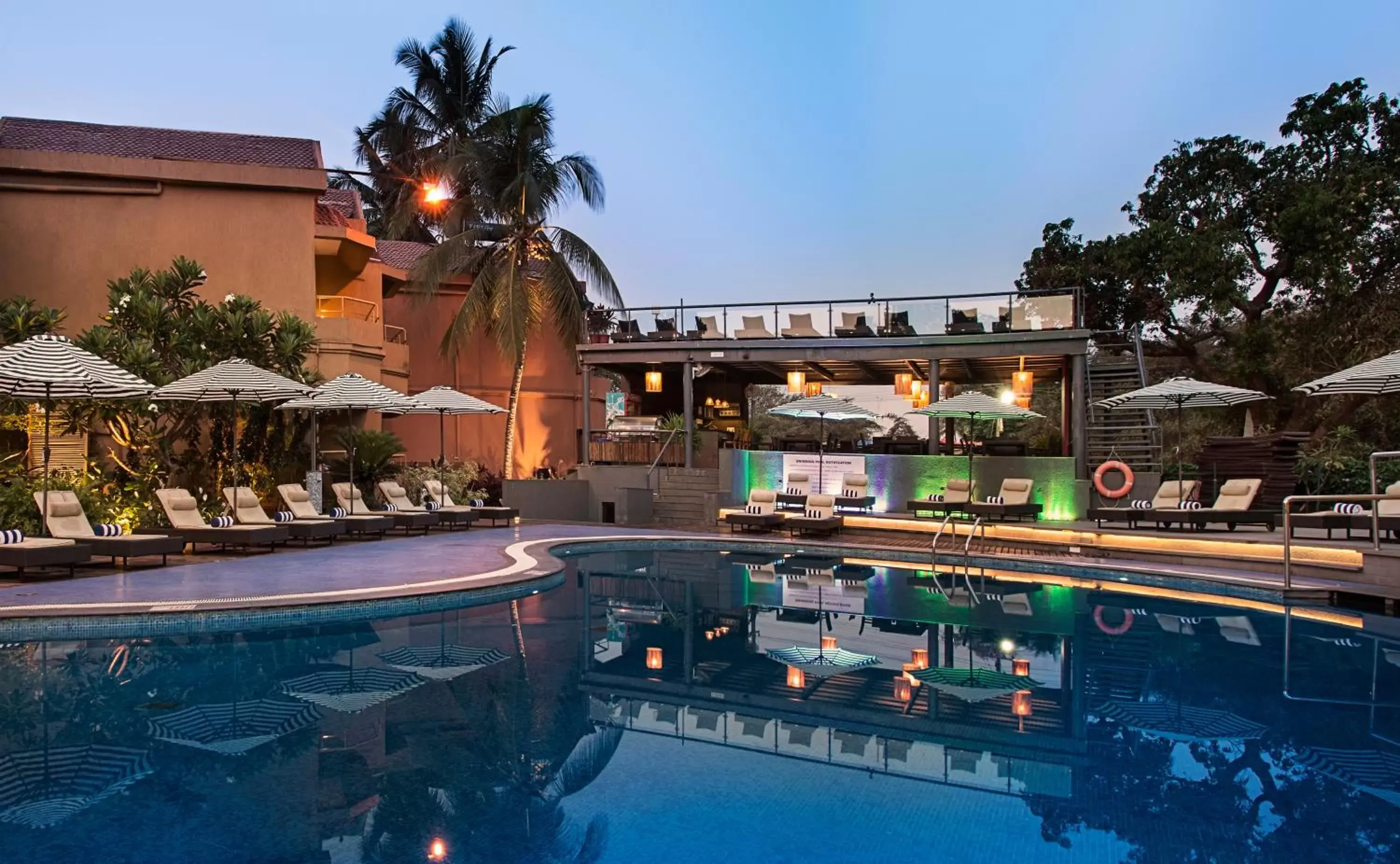 Lounge or bar, Swimming Pool in Whispering Palms Beach Resort