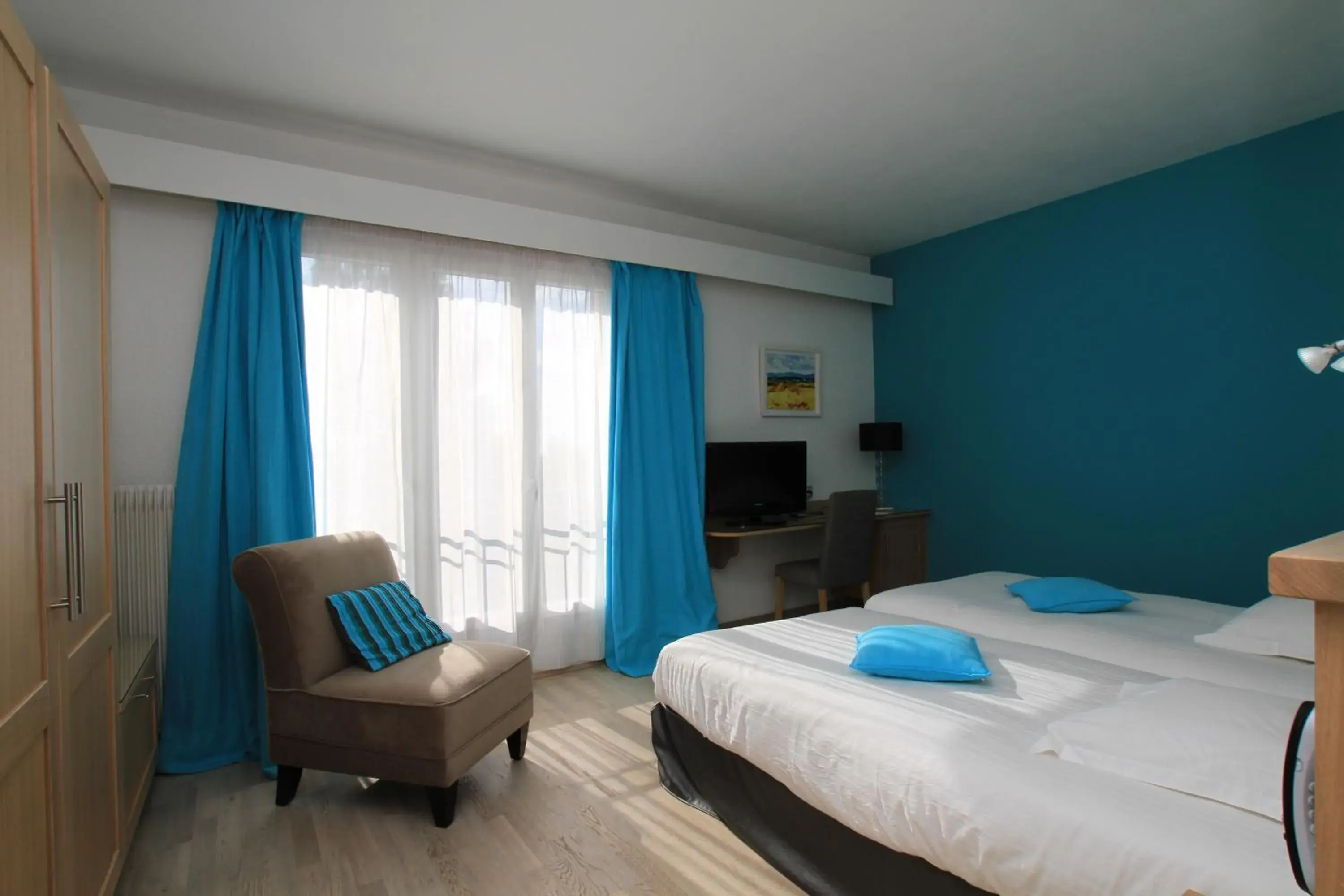 Photo of the whole room, Bed in Logis Hotel Restaurant Spa Beau Site Photo of the whole room, Bed in Logis Hotel Restaurant Spa Beau Site