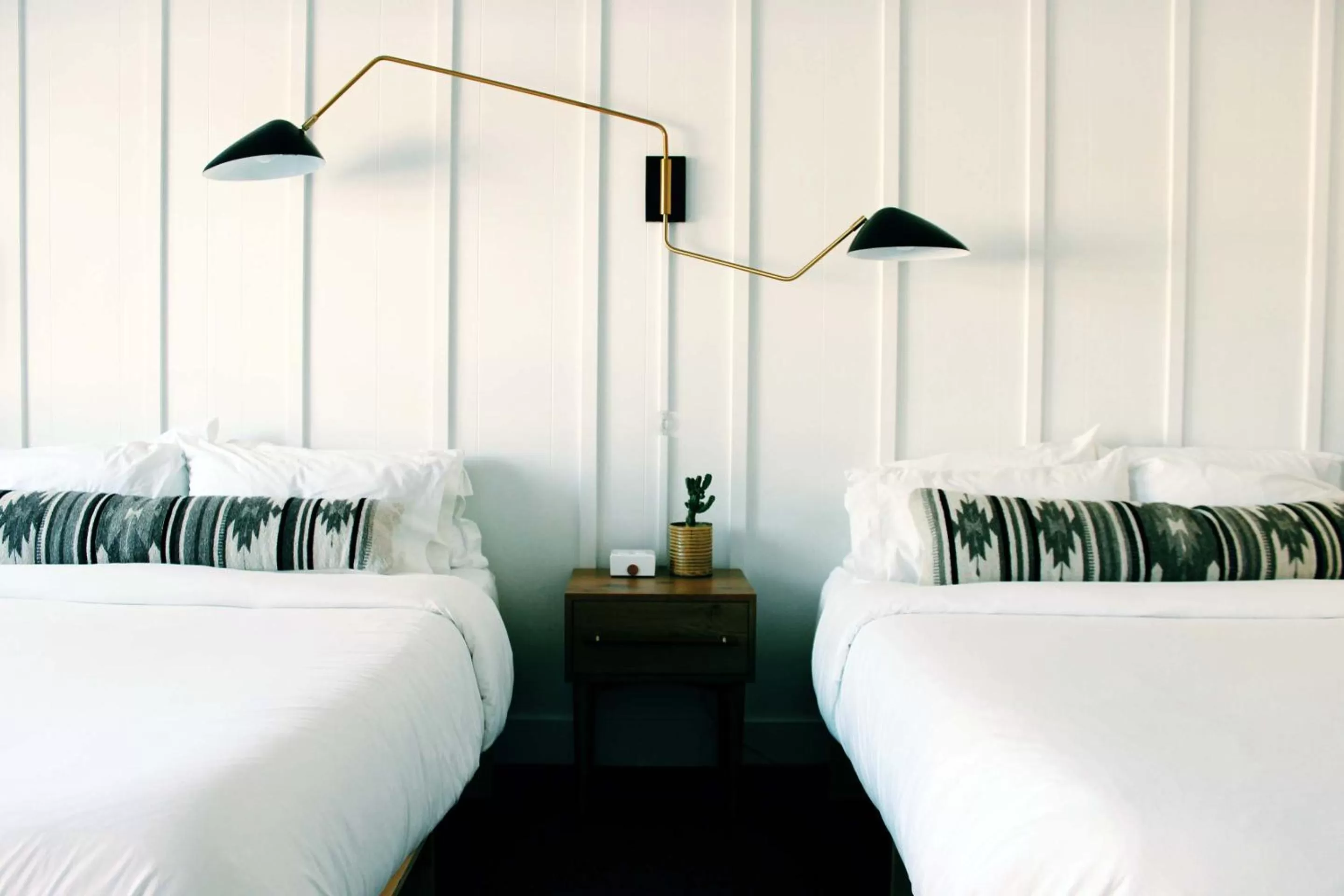 Bed in Amigo Motor Lodge