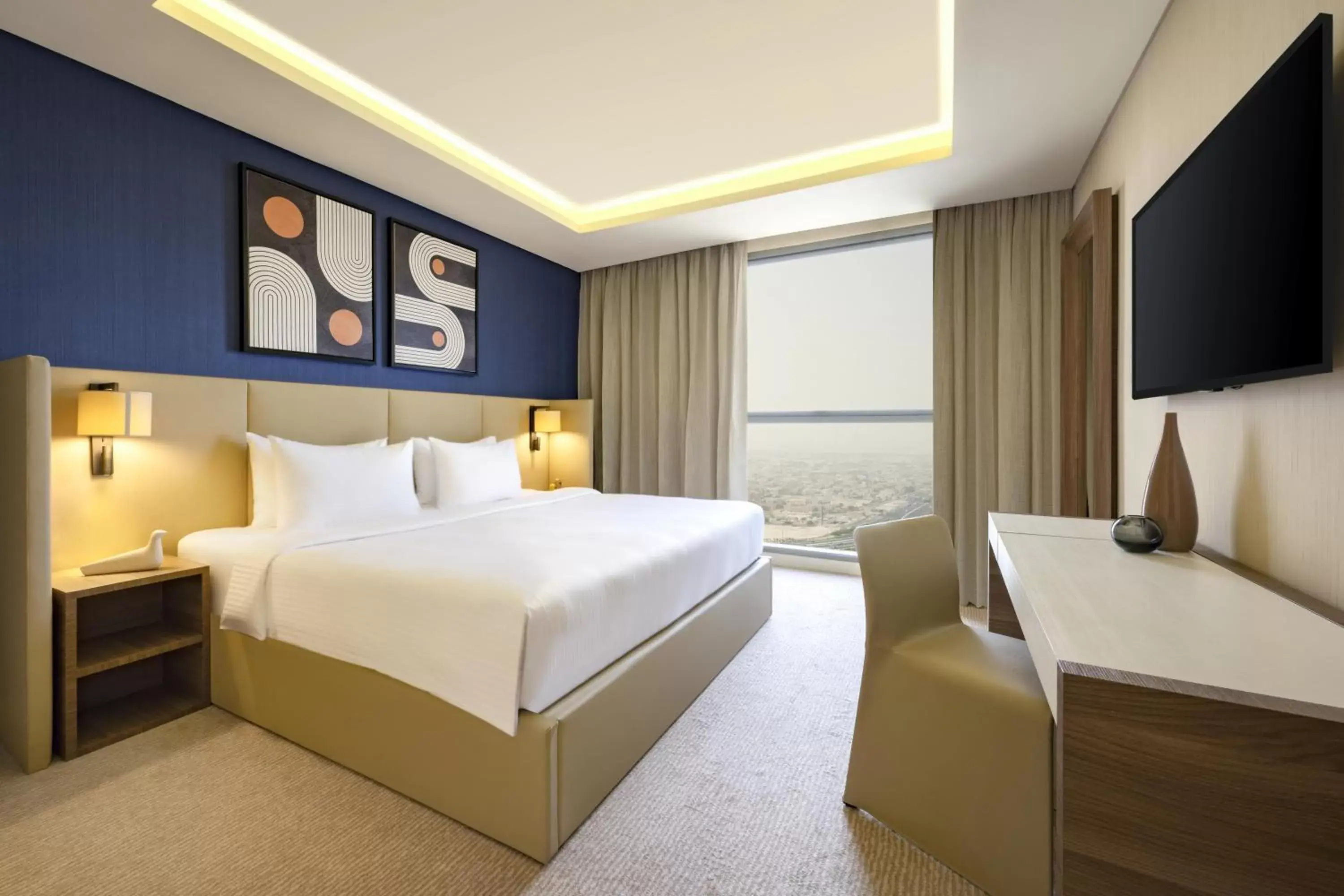 Bedroom, Bed in voco Doha West Bay Suites, an IHG Hotel