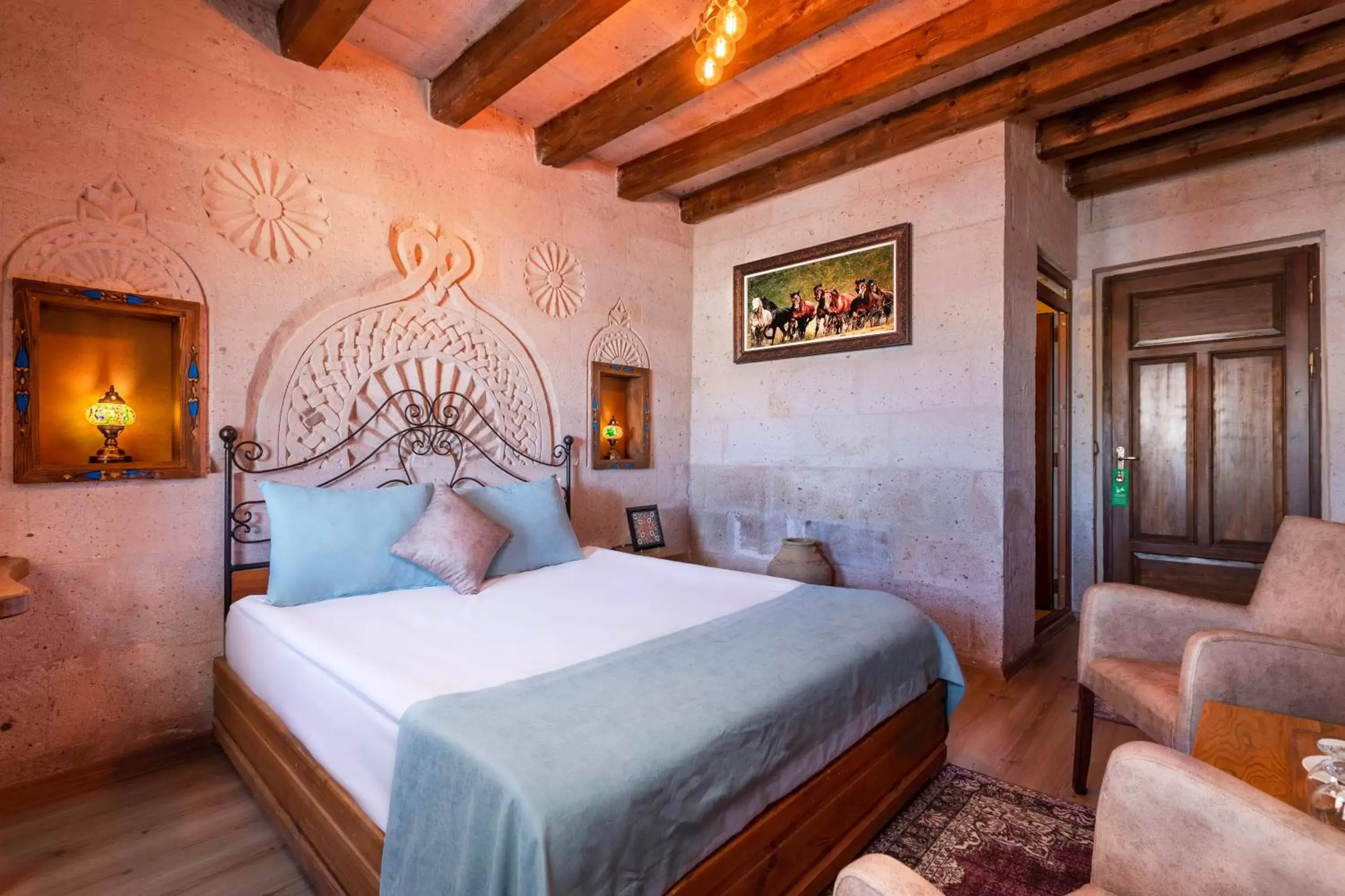 Seating area, Bed in Maron Stone House