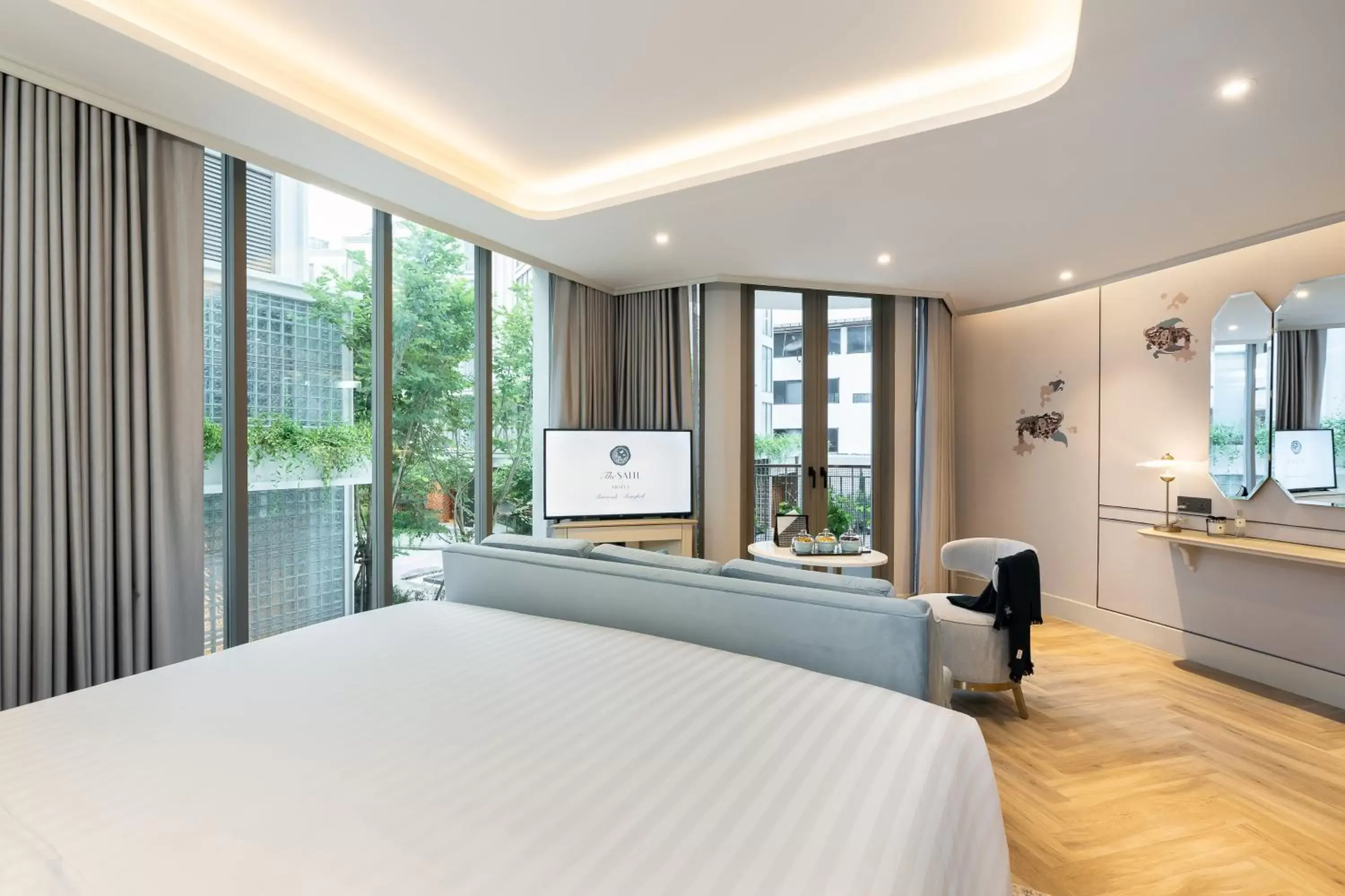 Bedroom in The Salil Hotel Riverside Bangkok