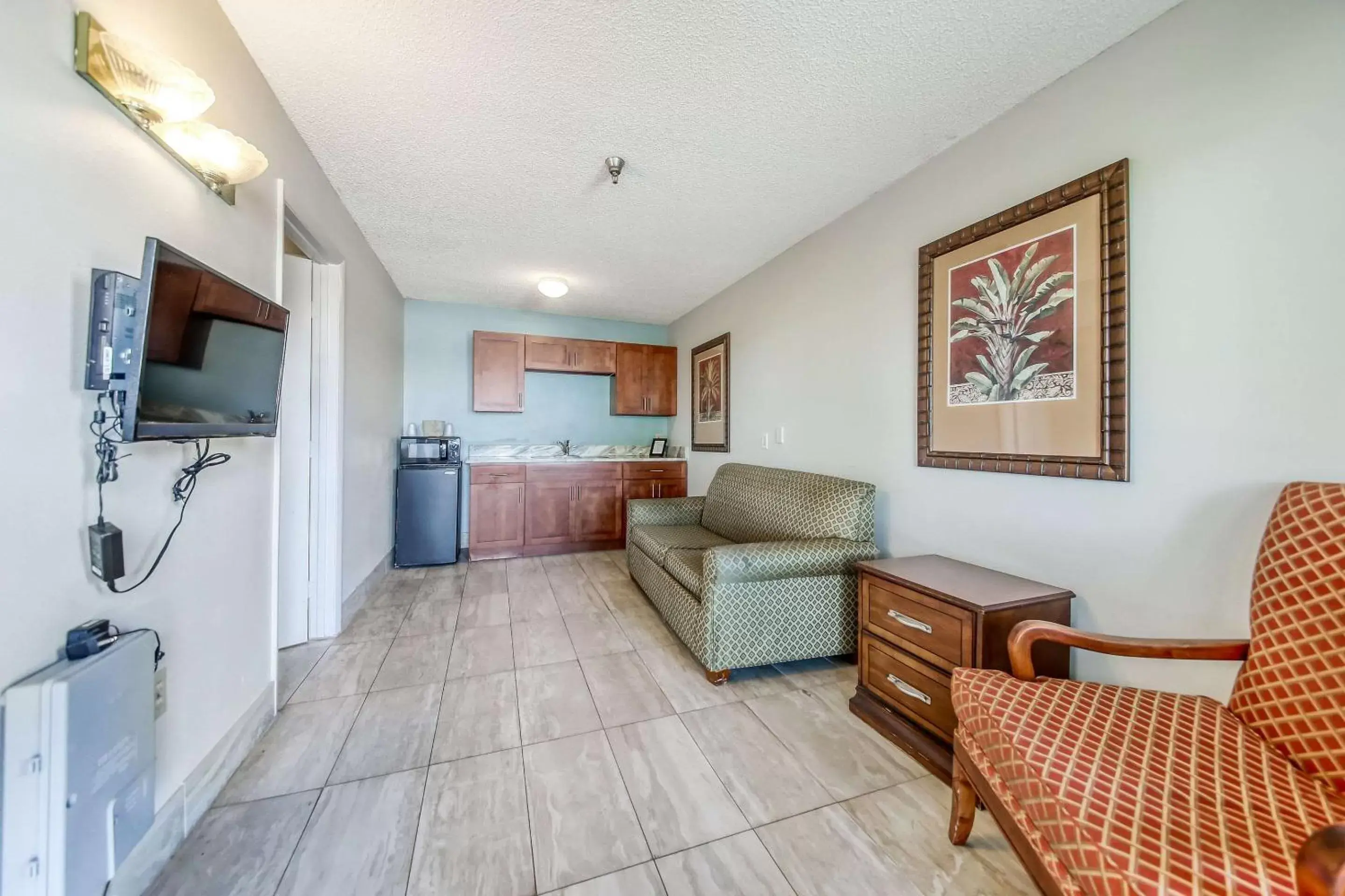 Bedroom, Seating Area in Rodeway Inn & Suites Haines City