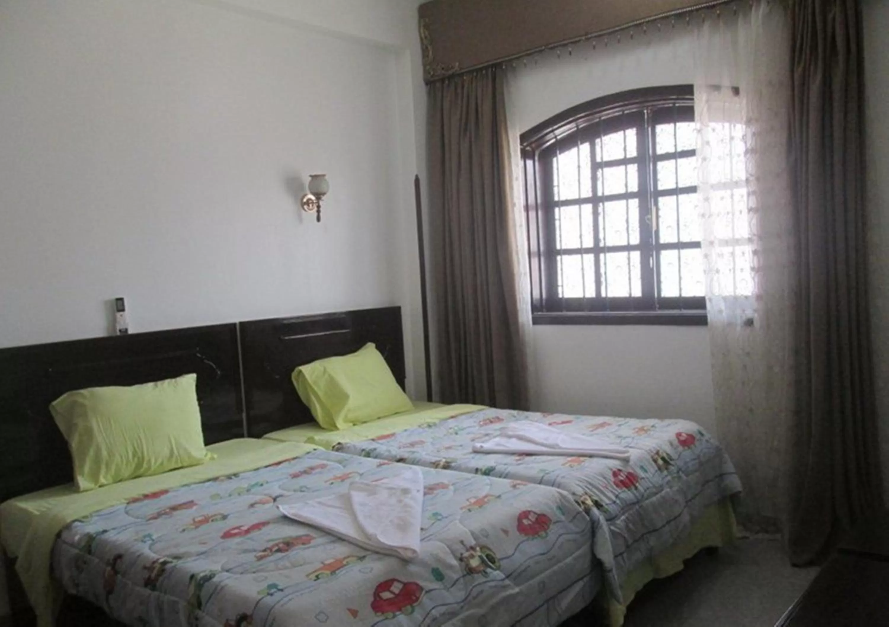 Bed in Mama Africa Apts & Studios