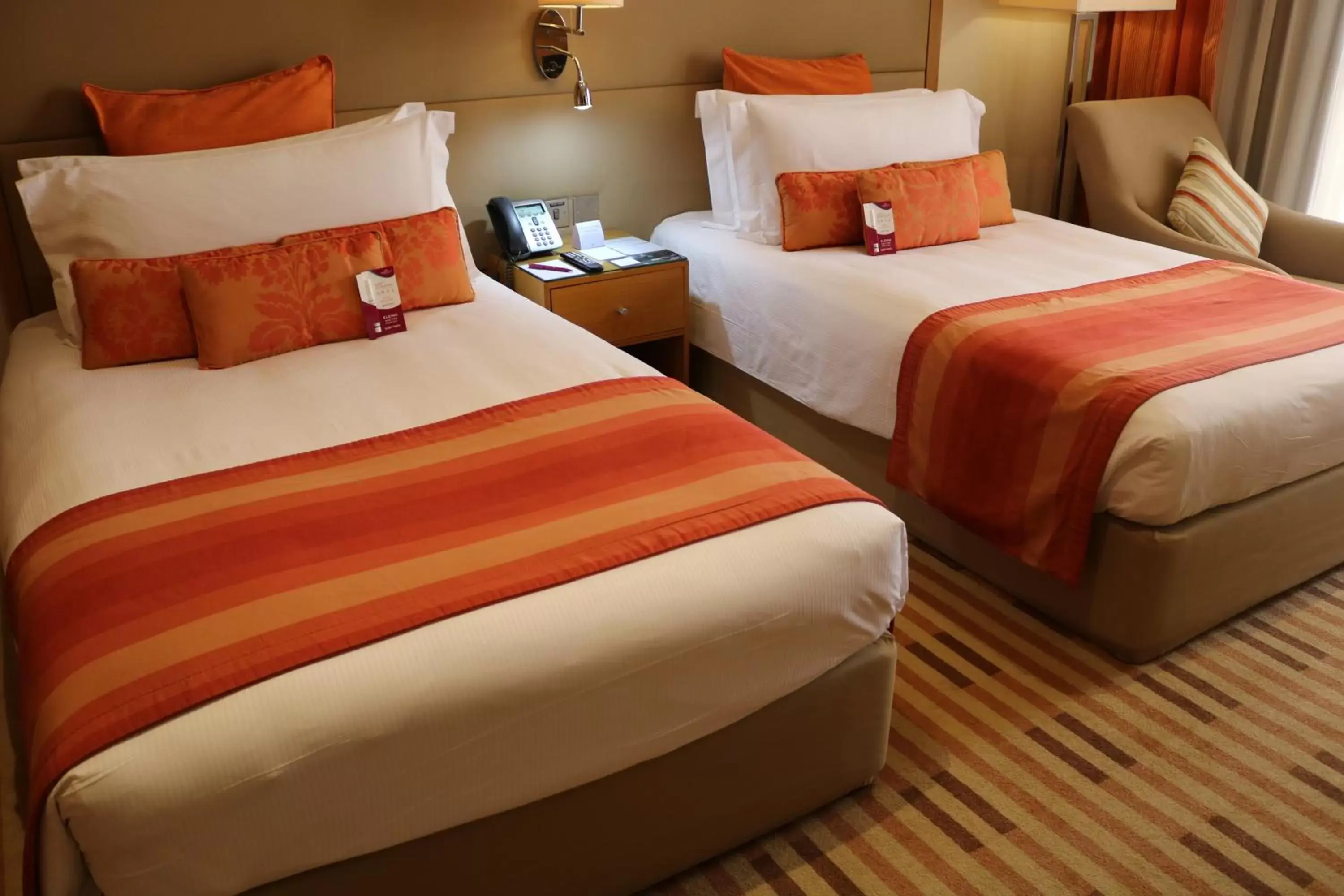 Bed in Crowne Plaza Sohar, an IHG Hotel