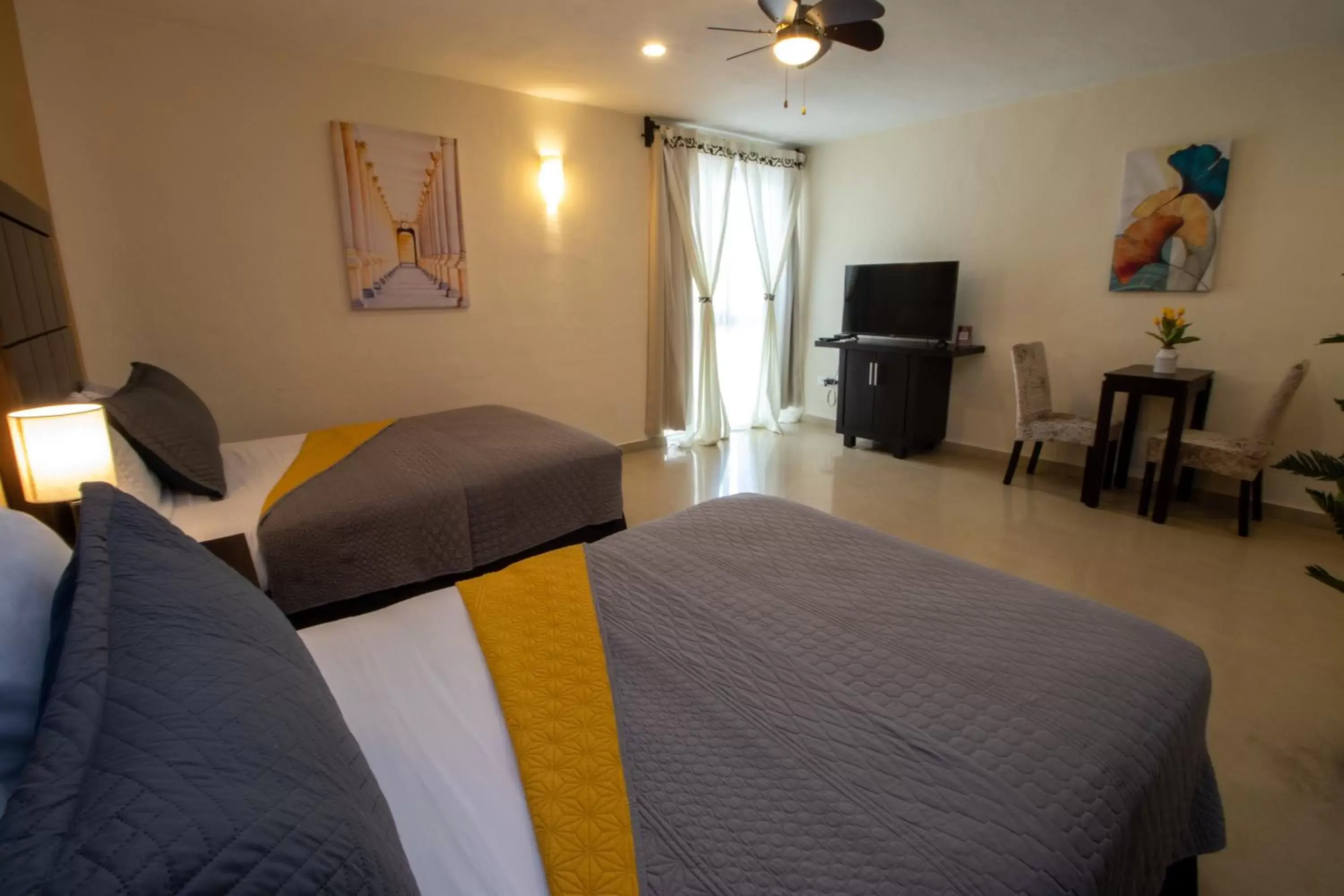 Photo of the whole room, Bed in Hotel Villas Segovia Suites Playa del Carmen