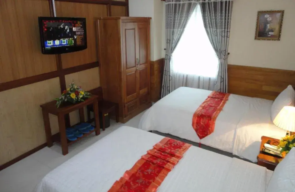 Bed in Hoang Yen Canary Hotel