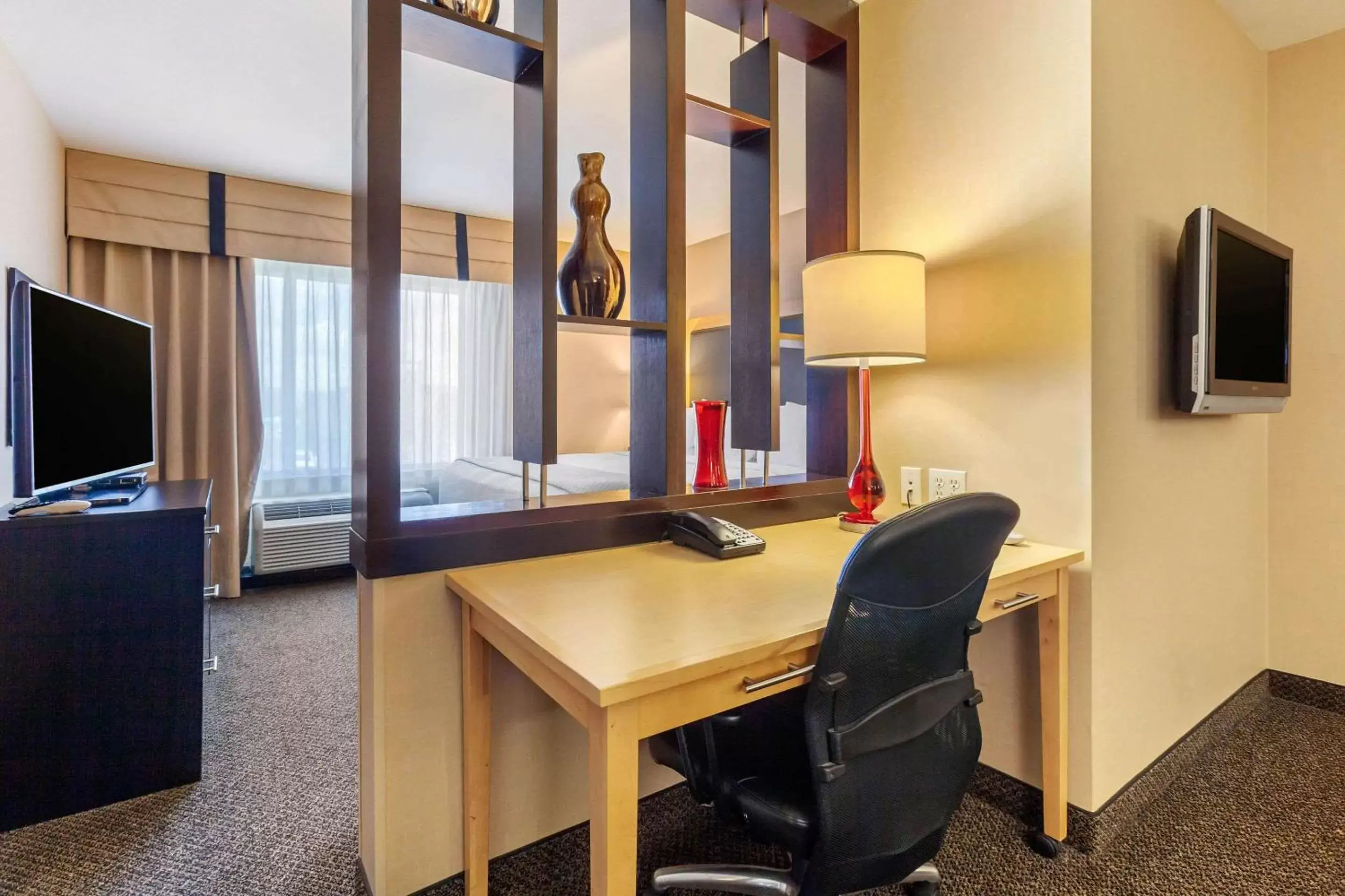 Photo of the whole room, TV/Entertainment Center in Cambria Hotel Ft Collins