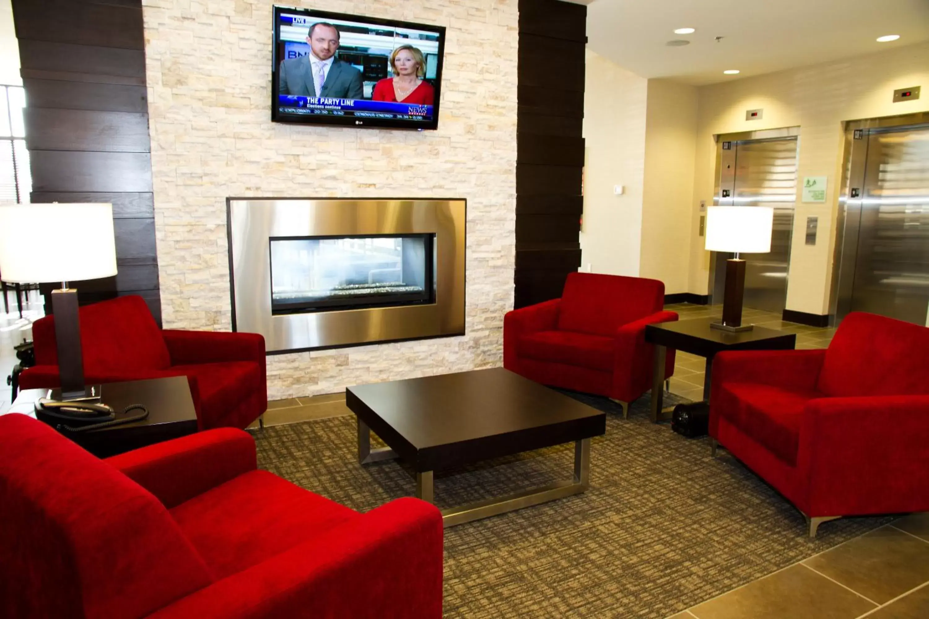 Lobby or reception, Seating Area in Holiday Inn Hotel & Suites Red Deer, an IHG Hotel