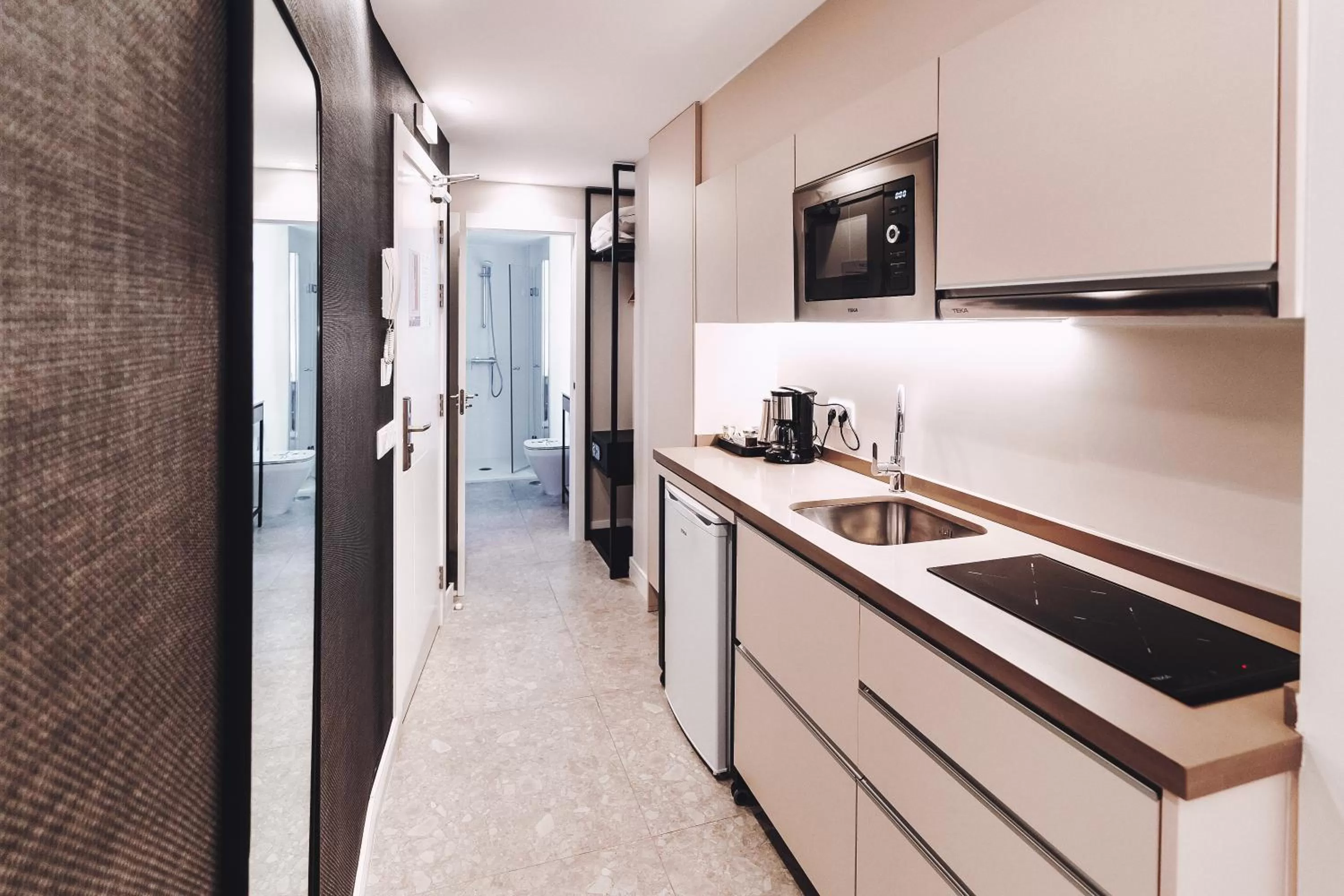 Kitchen or kitchenette in Posidonia Aparthotel