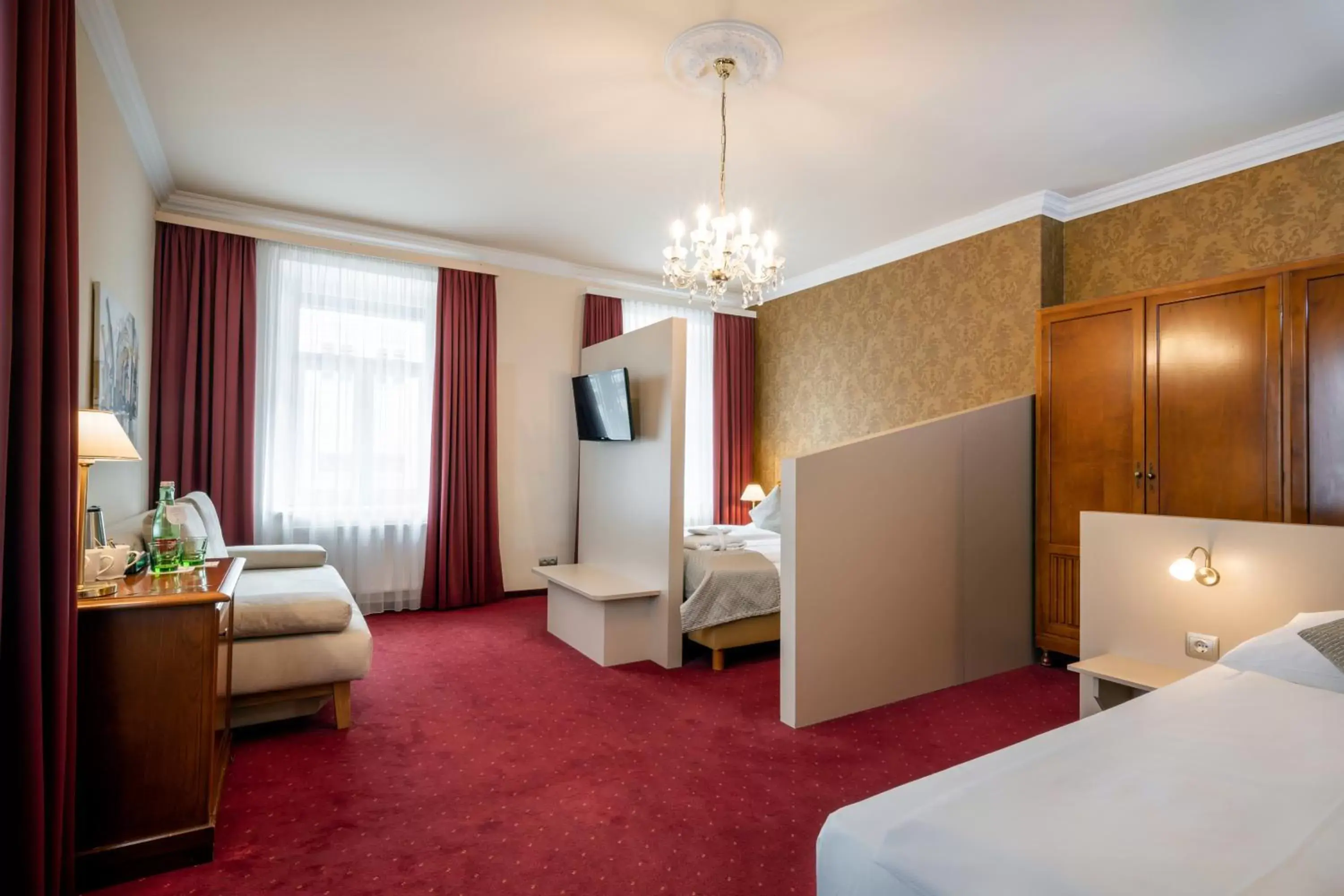 Bed, Seating Area in Hotel am Mirabellplatz