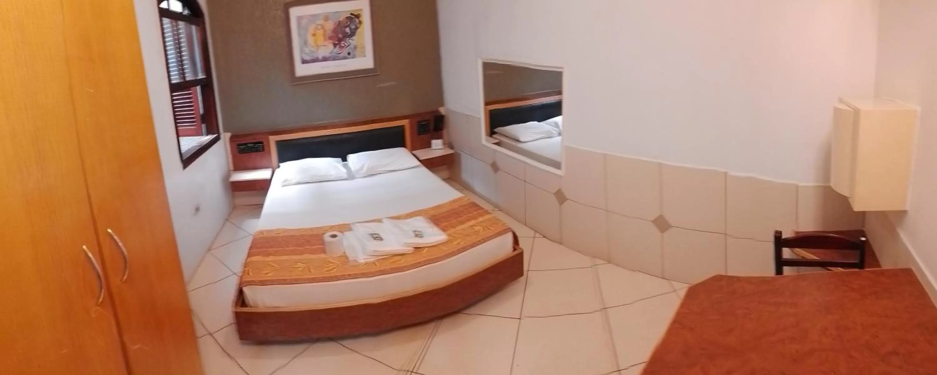 Bed in Hotel Smart Inn