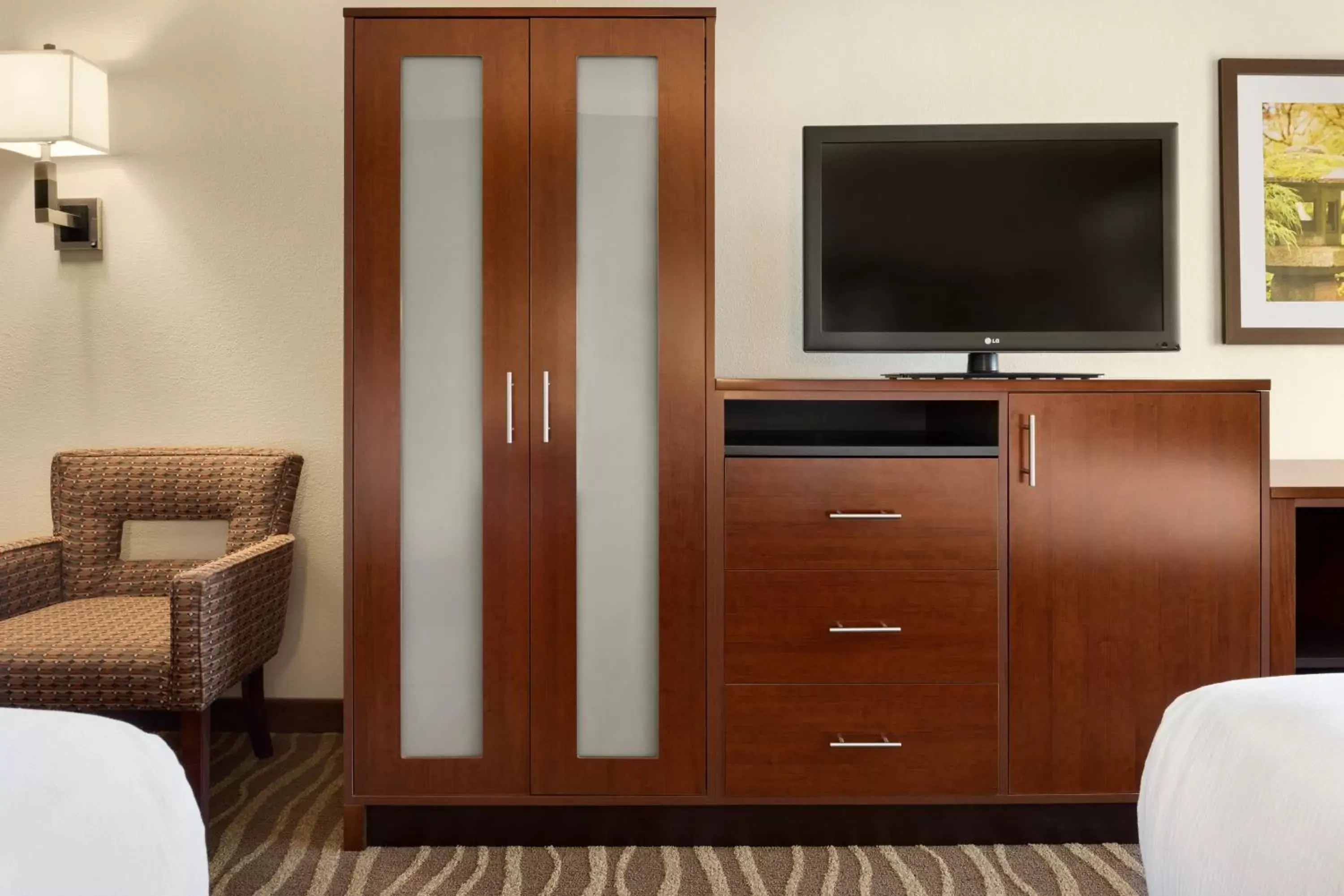 Photo of the whole room, TV/Entertainment Center in Holiday Inn Hotel & Suites Des Moines-Northwest, an IHG Hotel