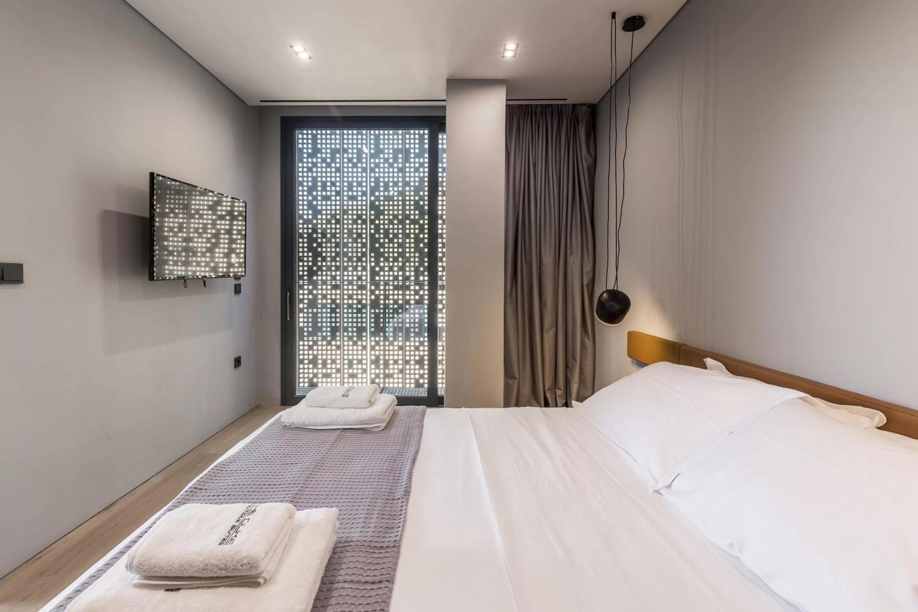 Bed in The Duke Boutique Suites