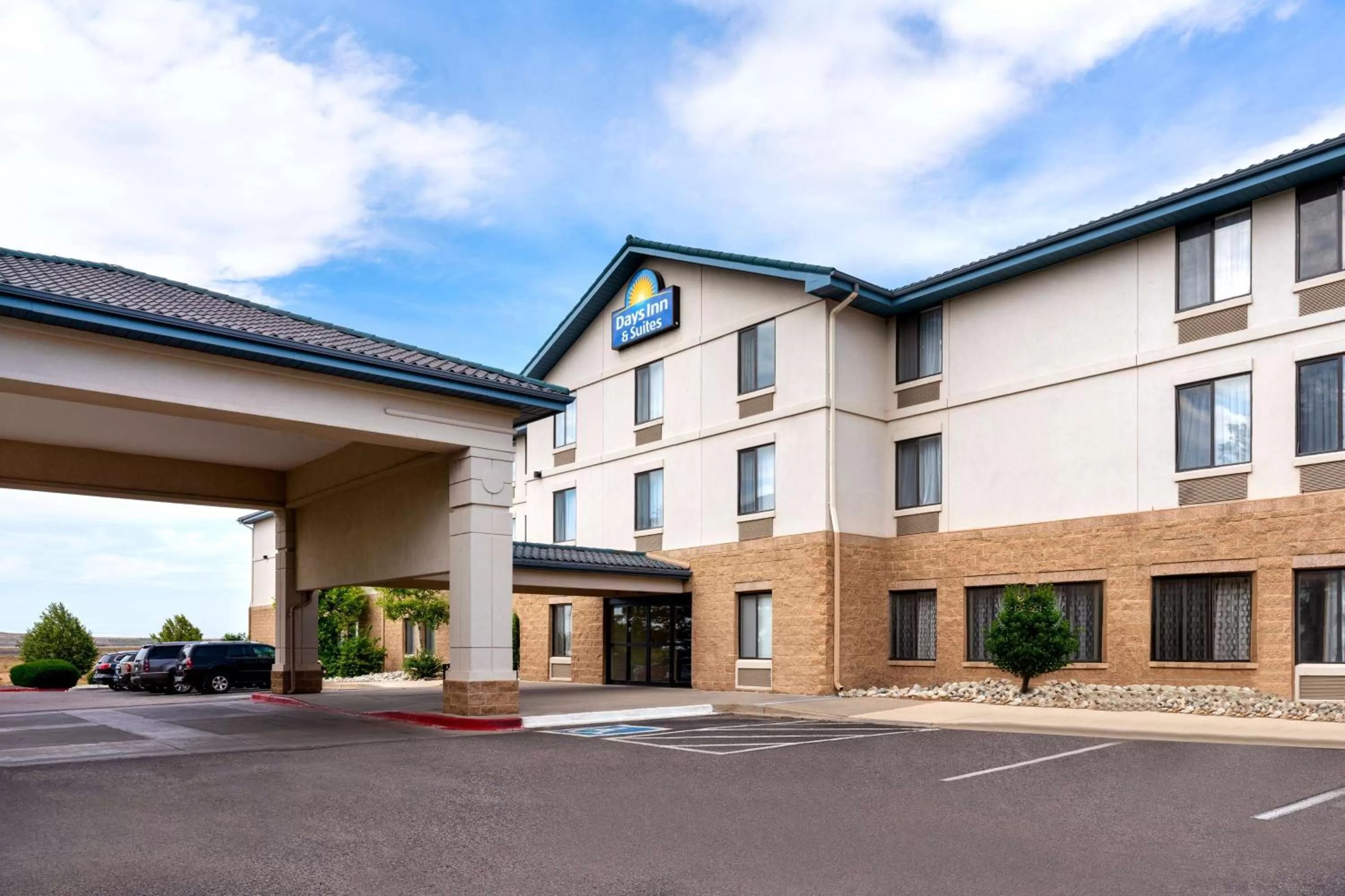 Property building in Days Inn & Suites by Wyndham Denver International Airport