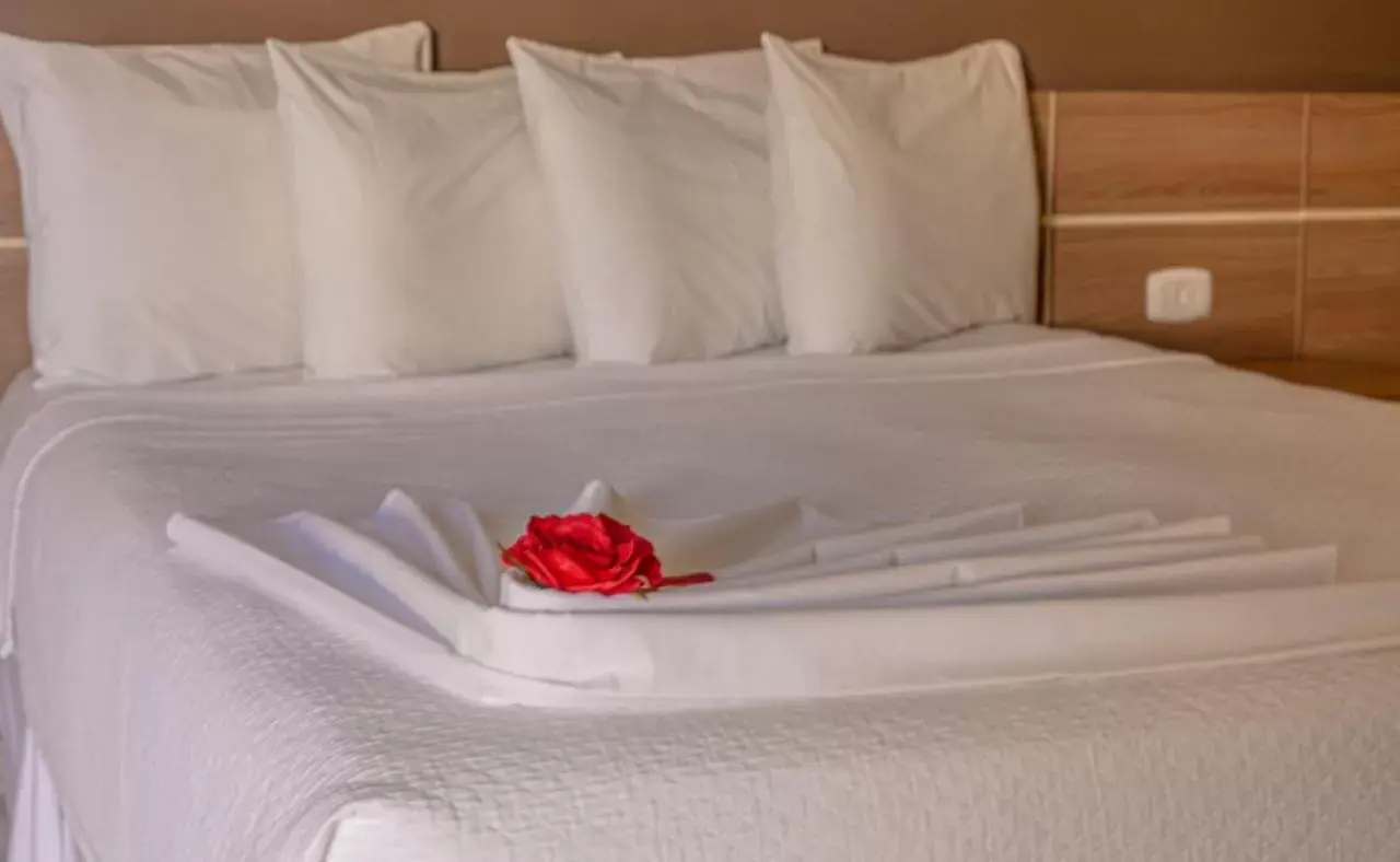 Bed in Safira Praia Hotel