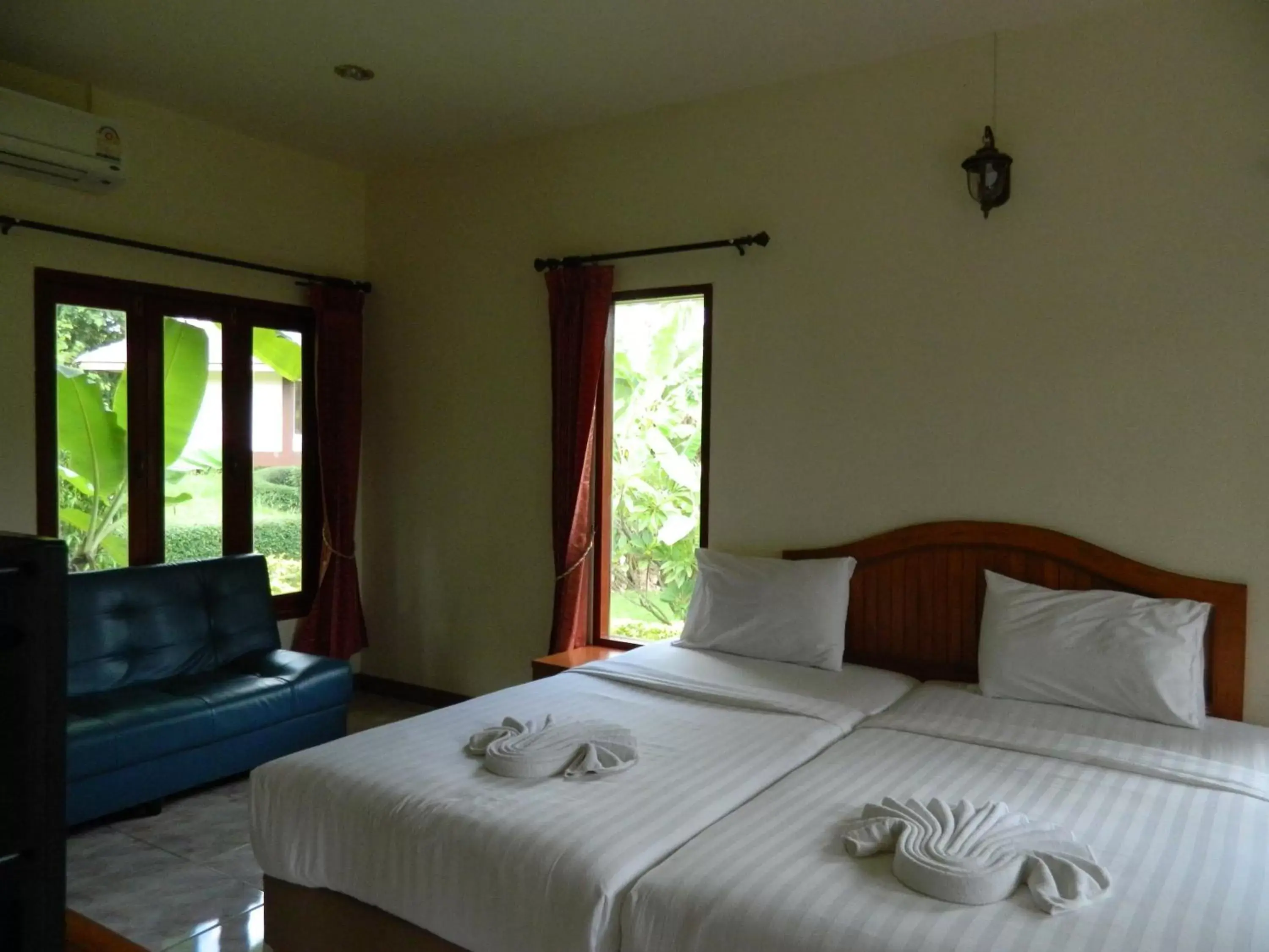 Bed in Pai Iyara Resort