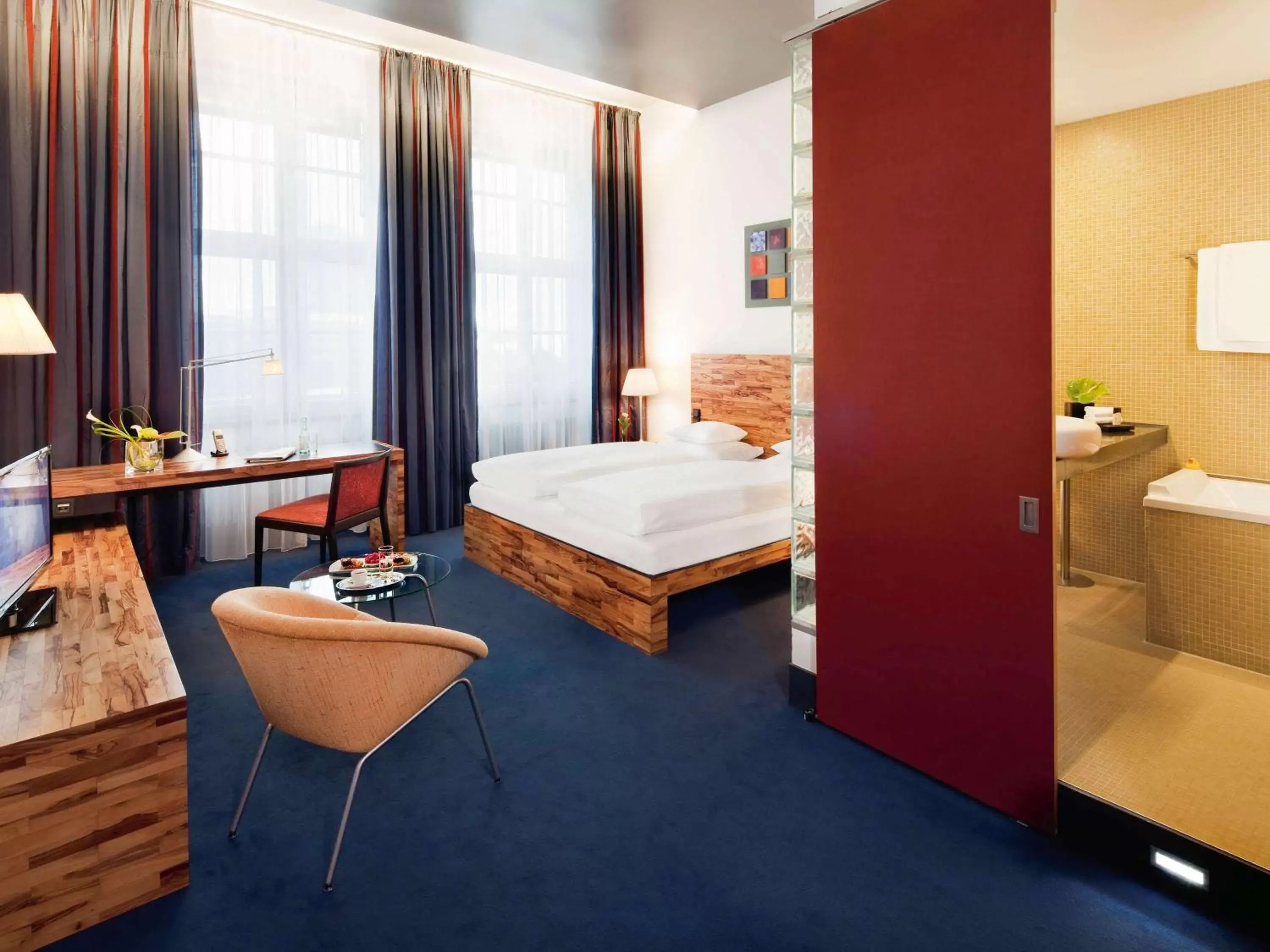 Photo of the whole room, Bed in Mövenpick Hotel Berlin Am Potsdamer Platz