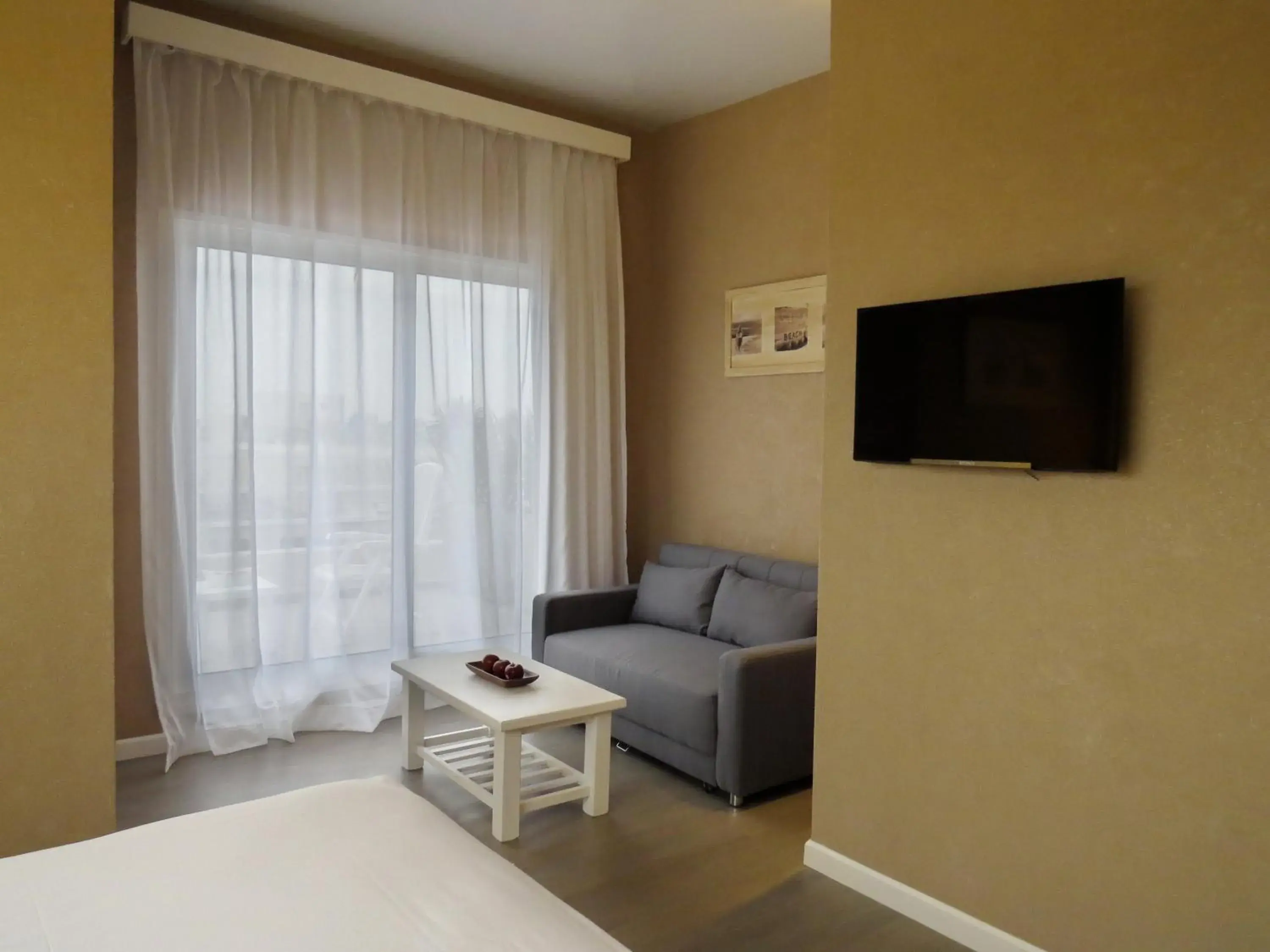 TV and multimedia, TV/Entertainment Center in Atlantico Boutique Hotel