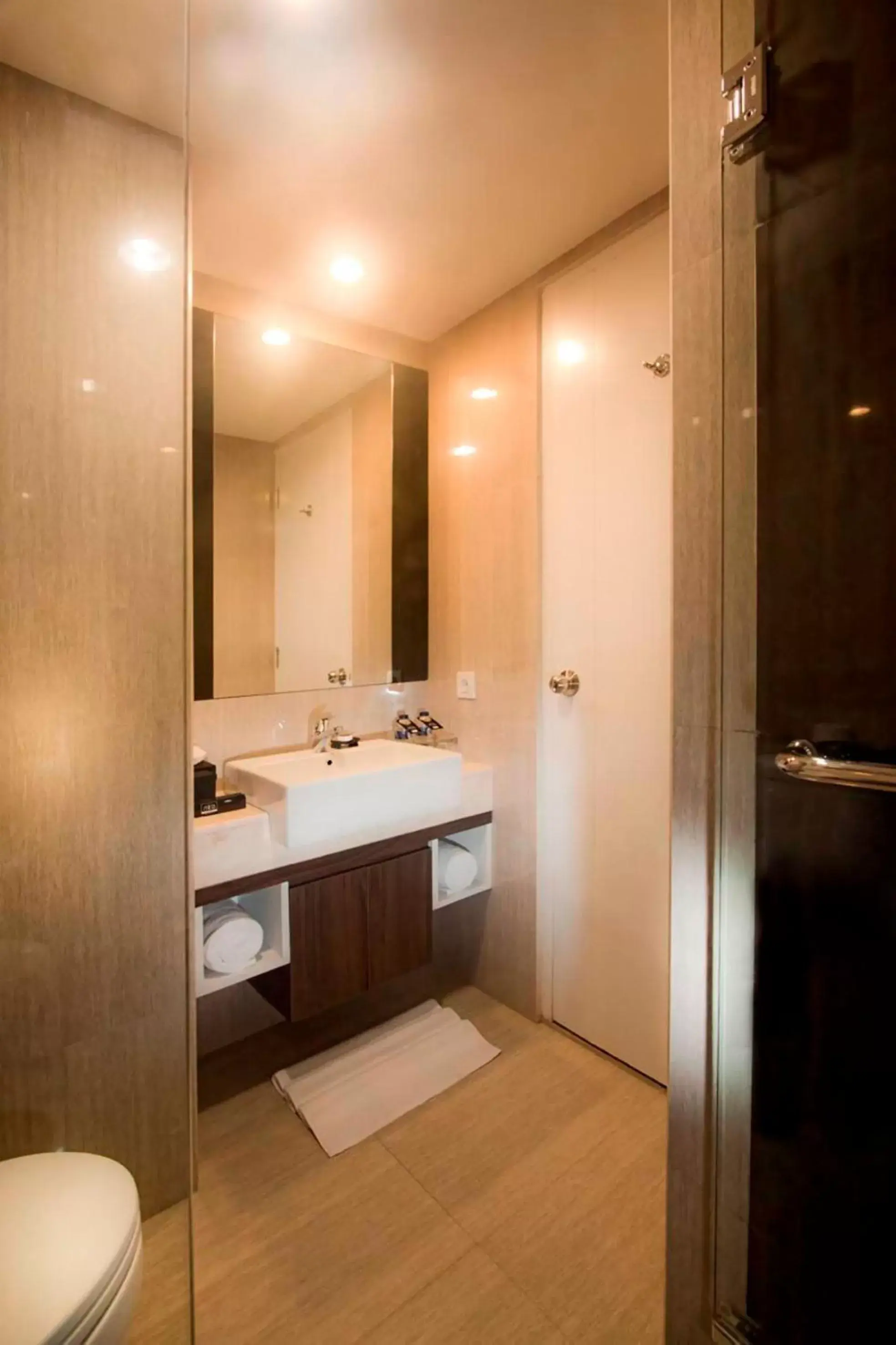 Bathroom in Neo Hotel Mangga Dua by ASTON