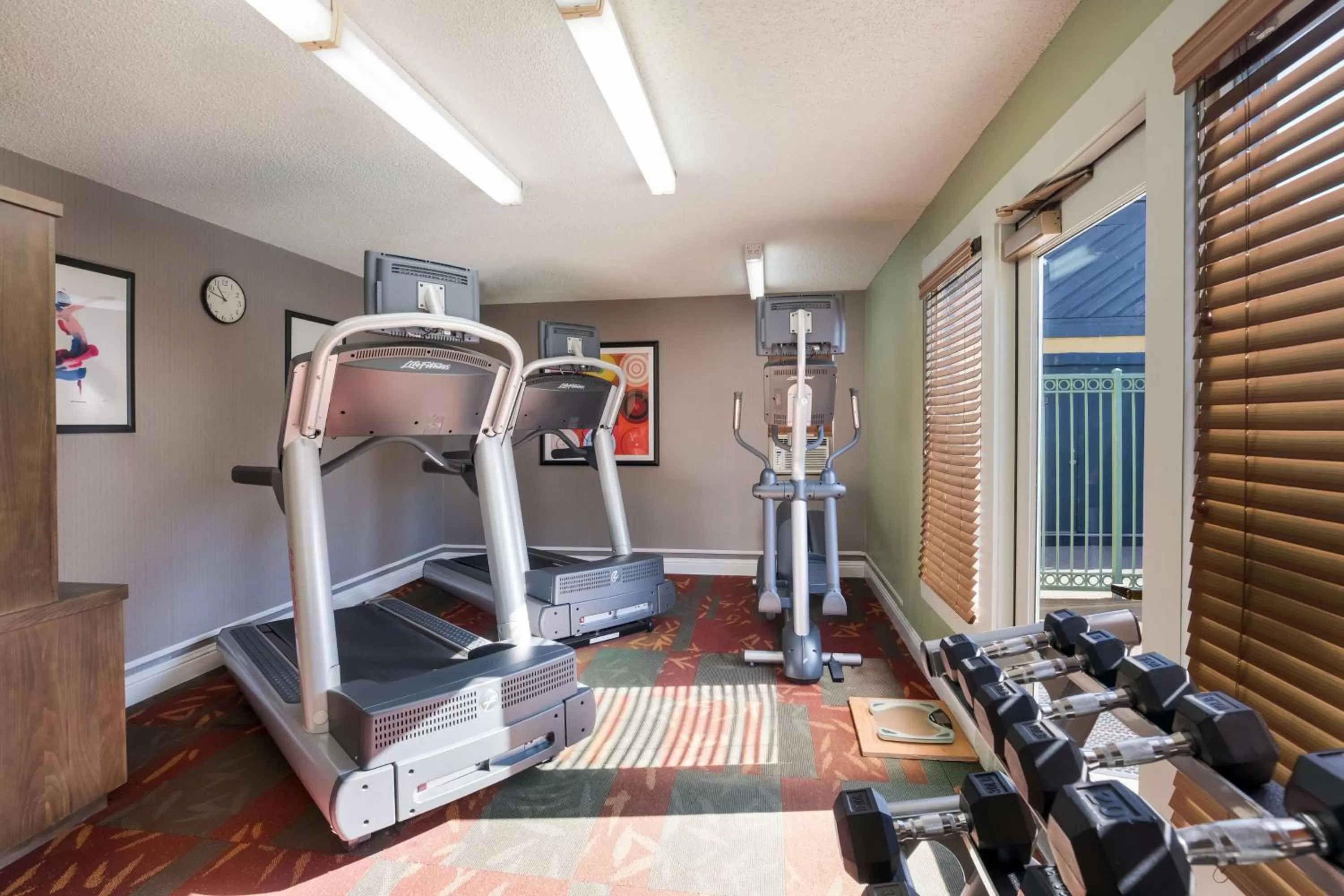 Fitness centre/facilities in SenS Suites Livermore; SureStay Collection by Best Western
