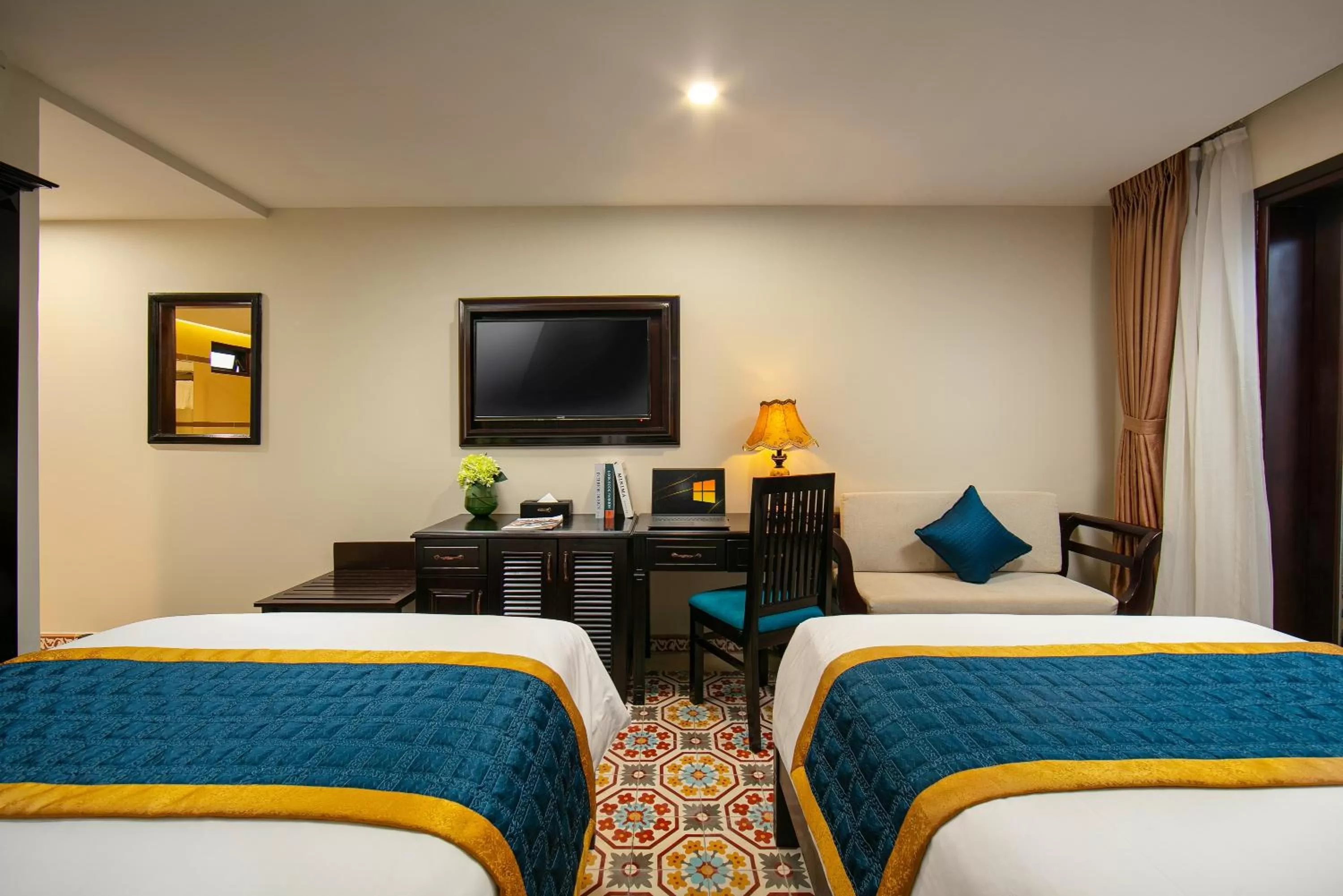 Bed in La Charm Hoi An Hotel & Spa