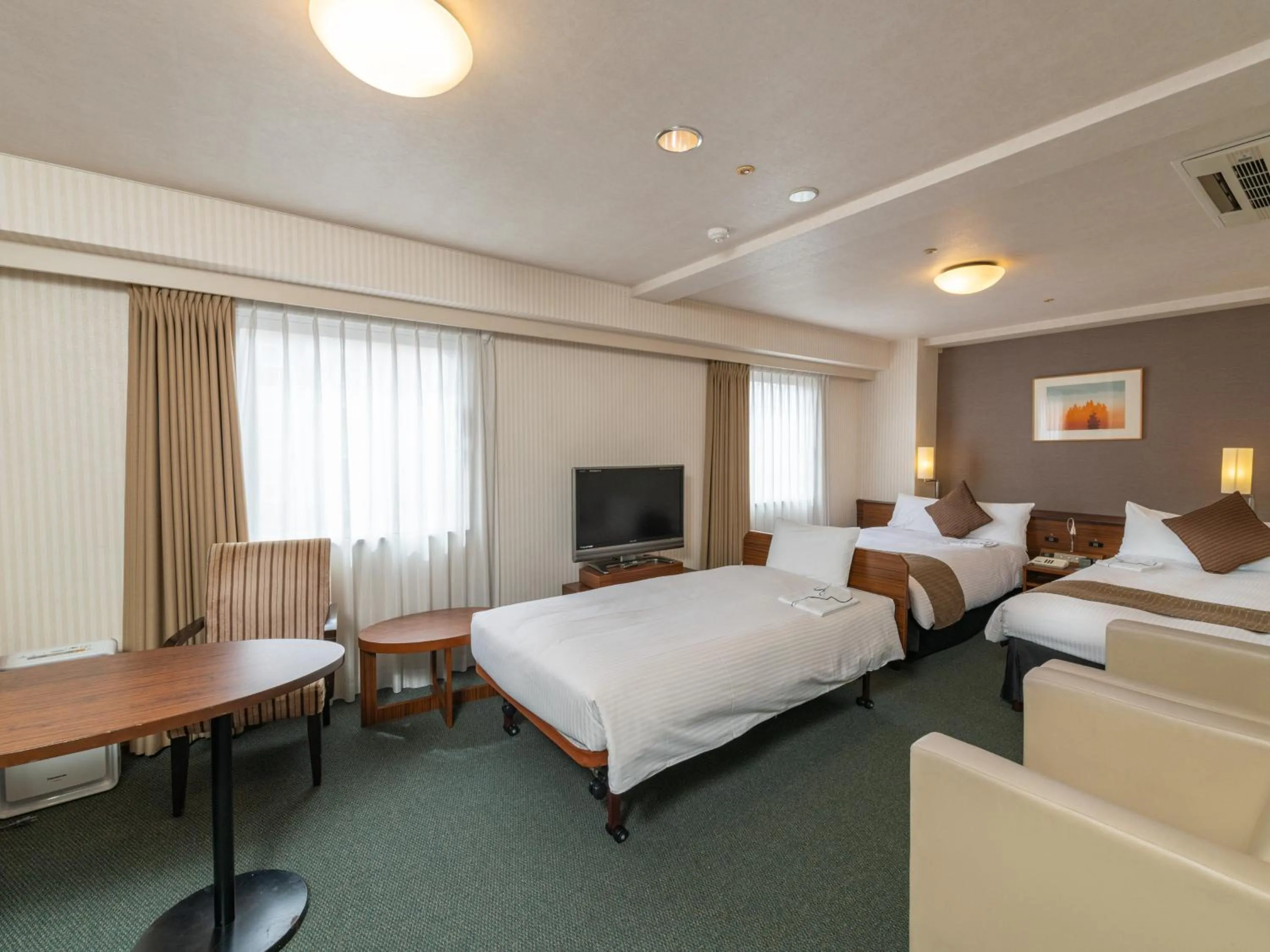 Bed in Alpico Plaza Hotel