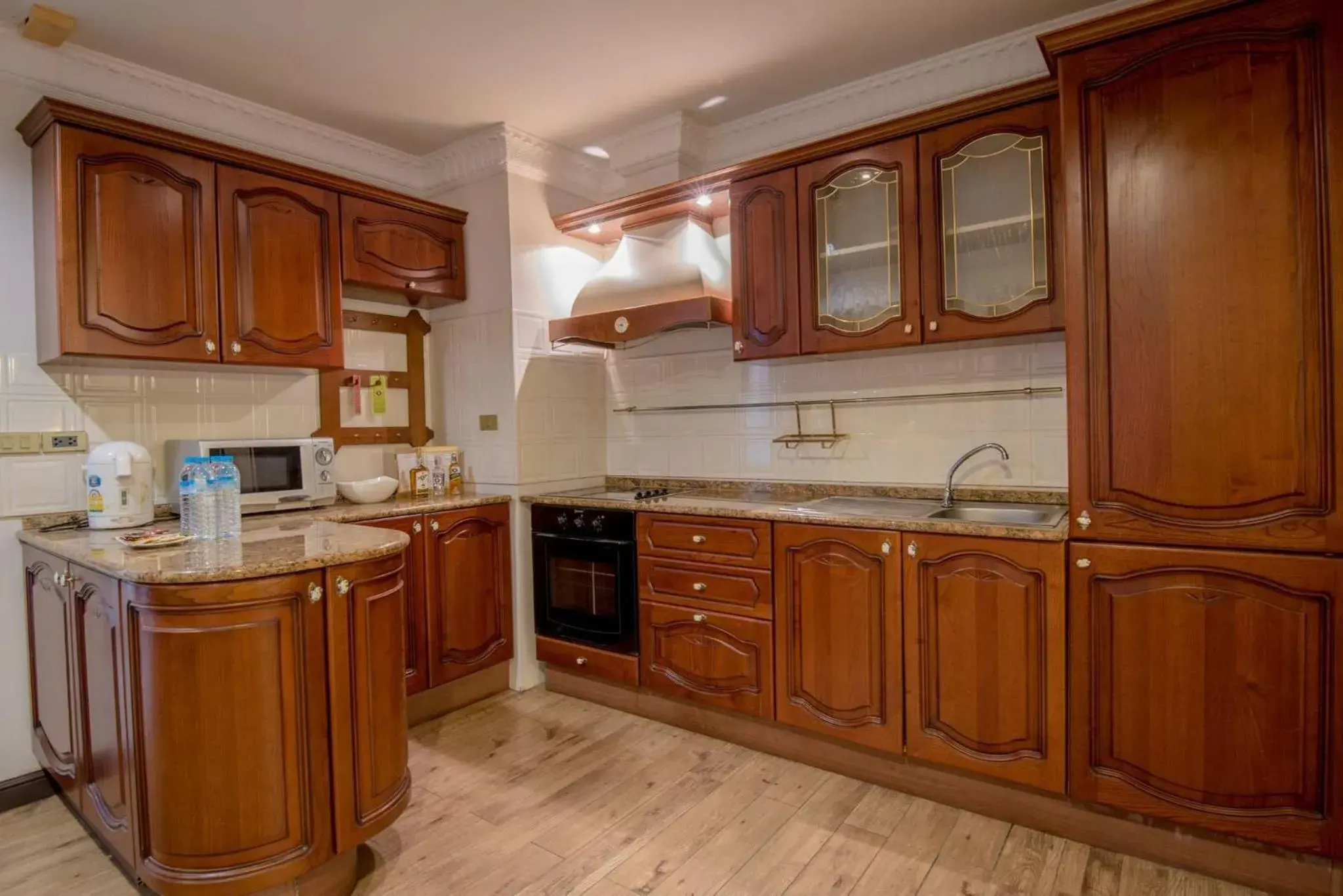 Kitchen or kitchenette, Kitchen/Kitchenette in Four Seasons Place Hotel