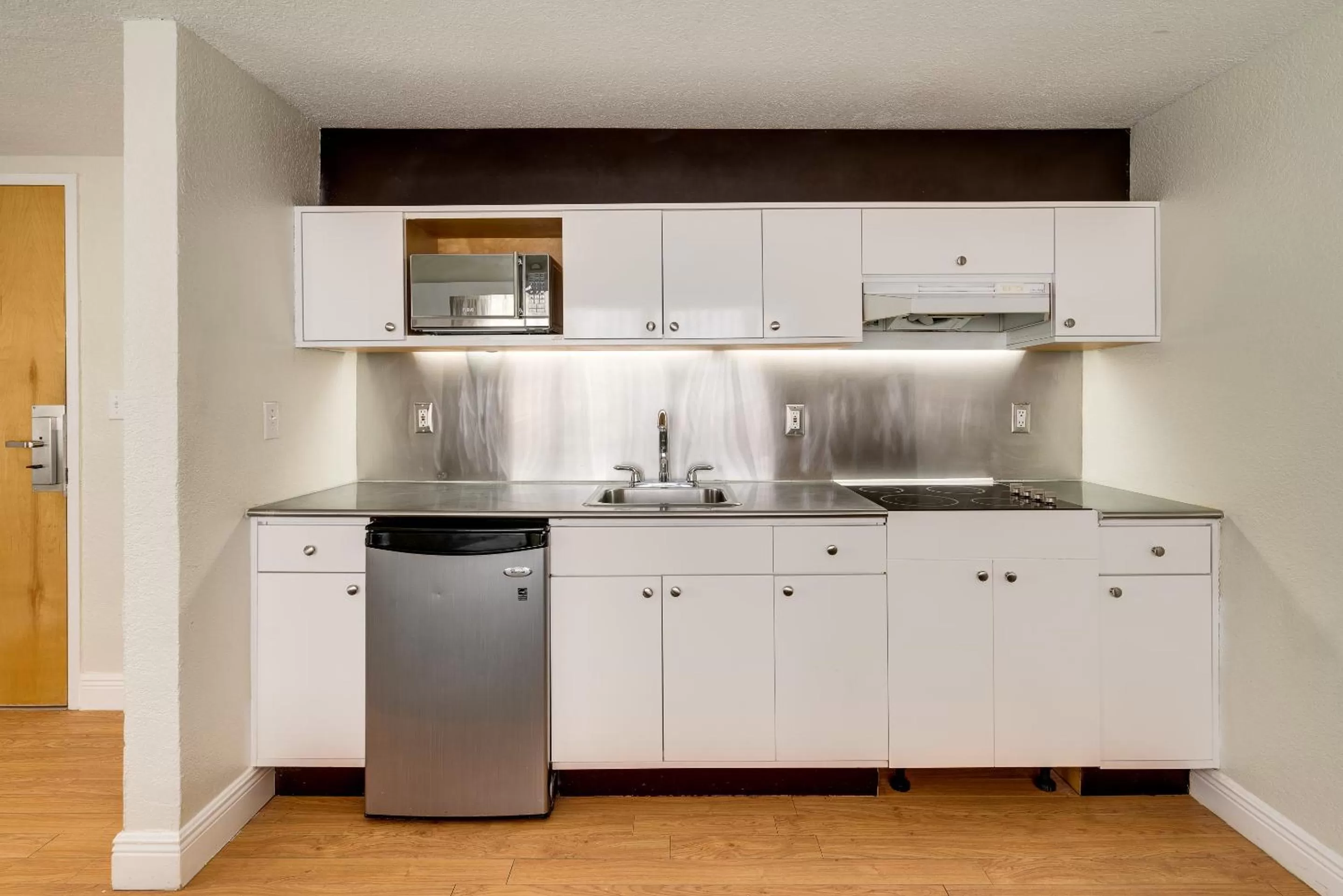 Kitchen or kitchenette in Crest Hotel Suites