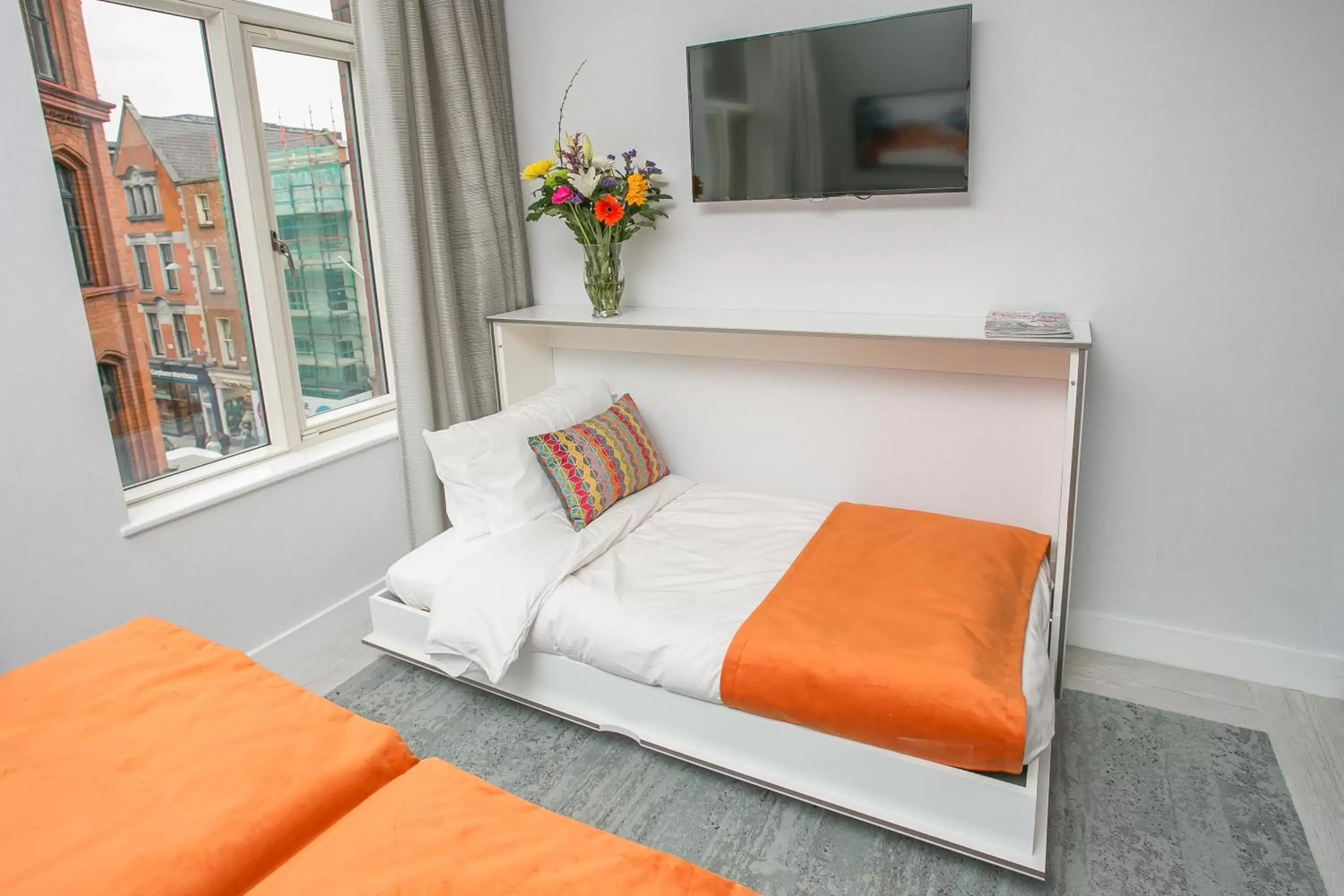 Bed in Grafton Street Studios by City Break Apartments