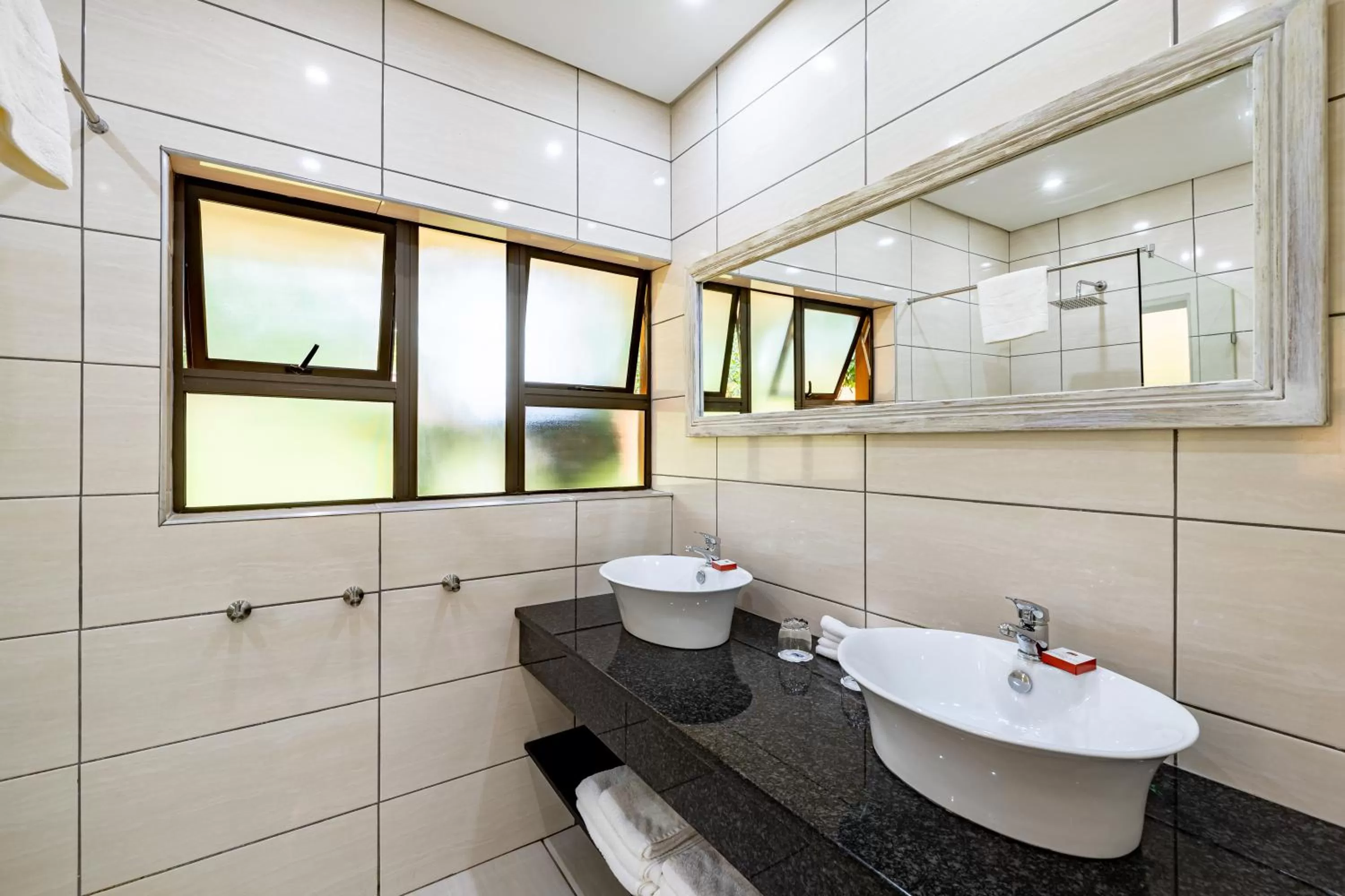 Bathroom in African Sky Hotels - Pine Lake Inn