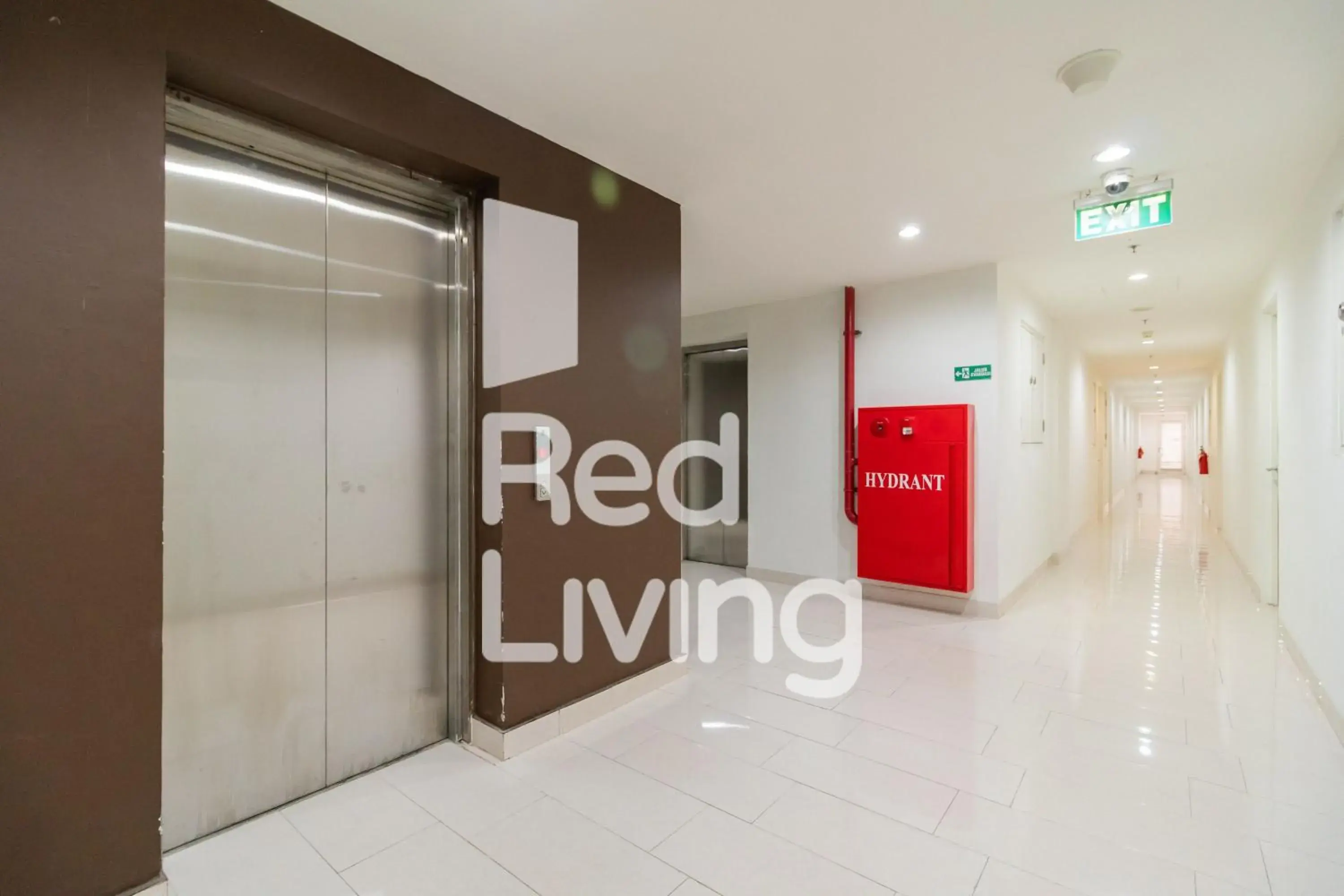 elevator, Property Logo/Sign in RedLiving Apartemen Sentul Tower - Skyland