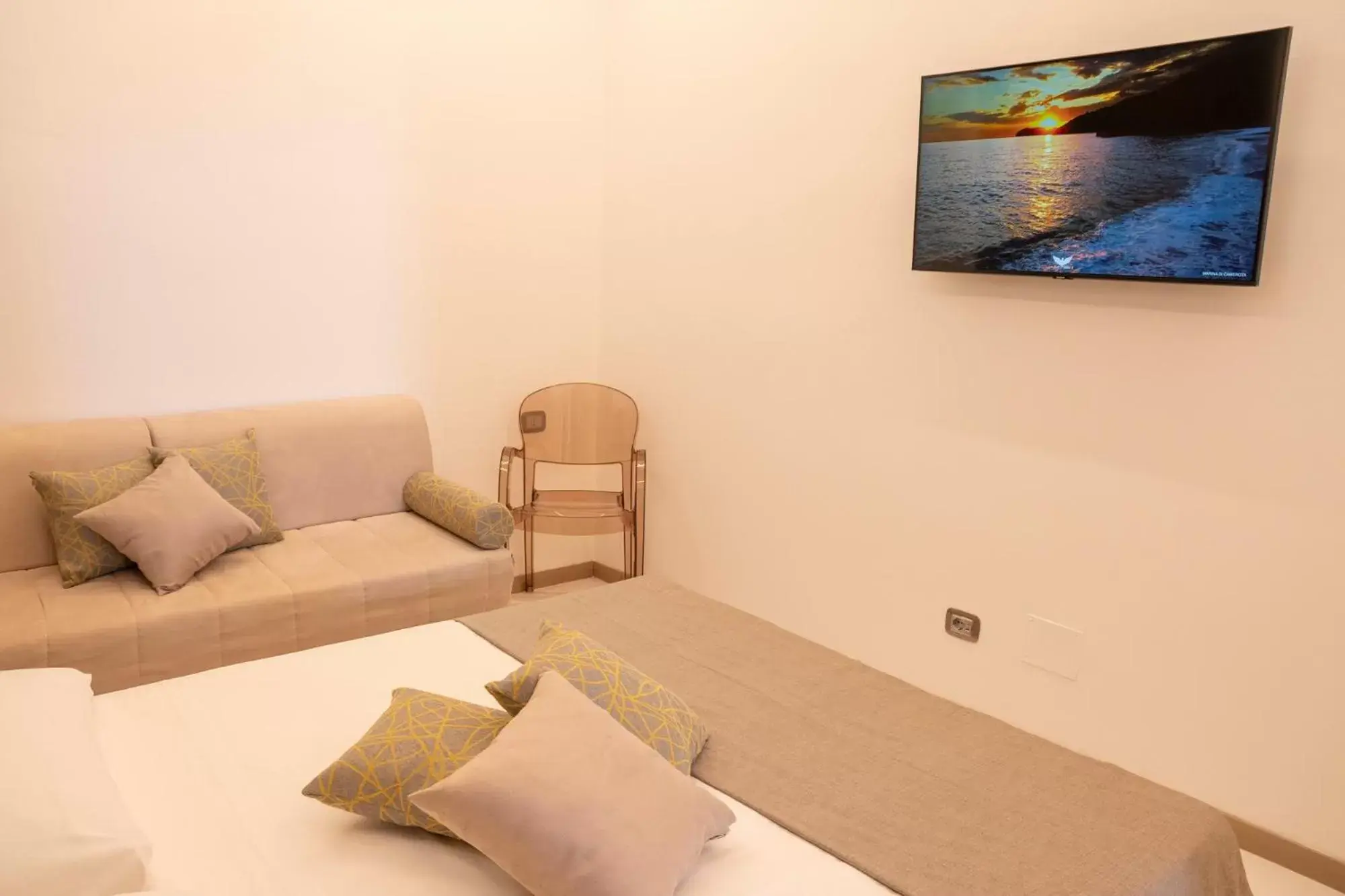 TV and multimedia, Seating Area in BelMa' Aparthotel and Rooms