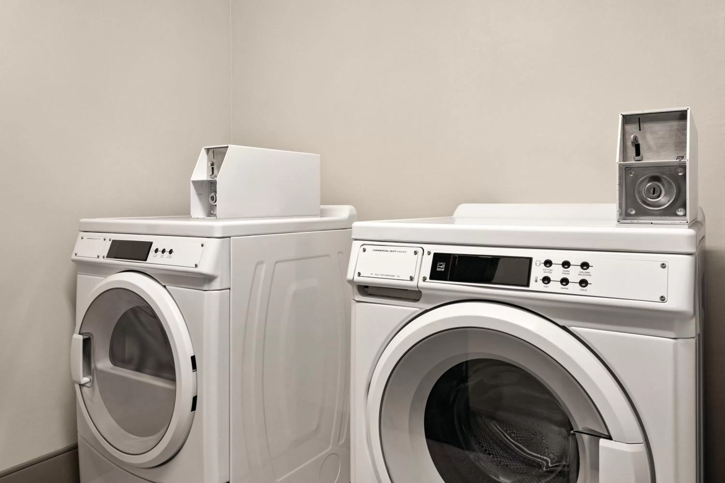washing machine in Country Inn & Suites by Radisson, Byram-Jackson South, MS