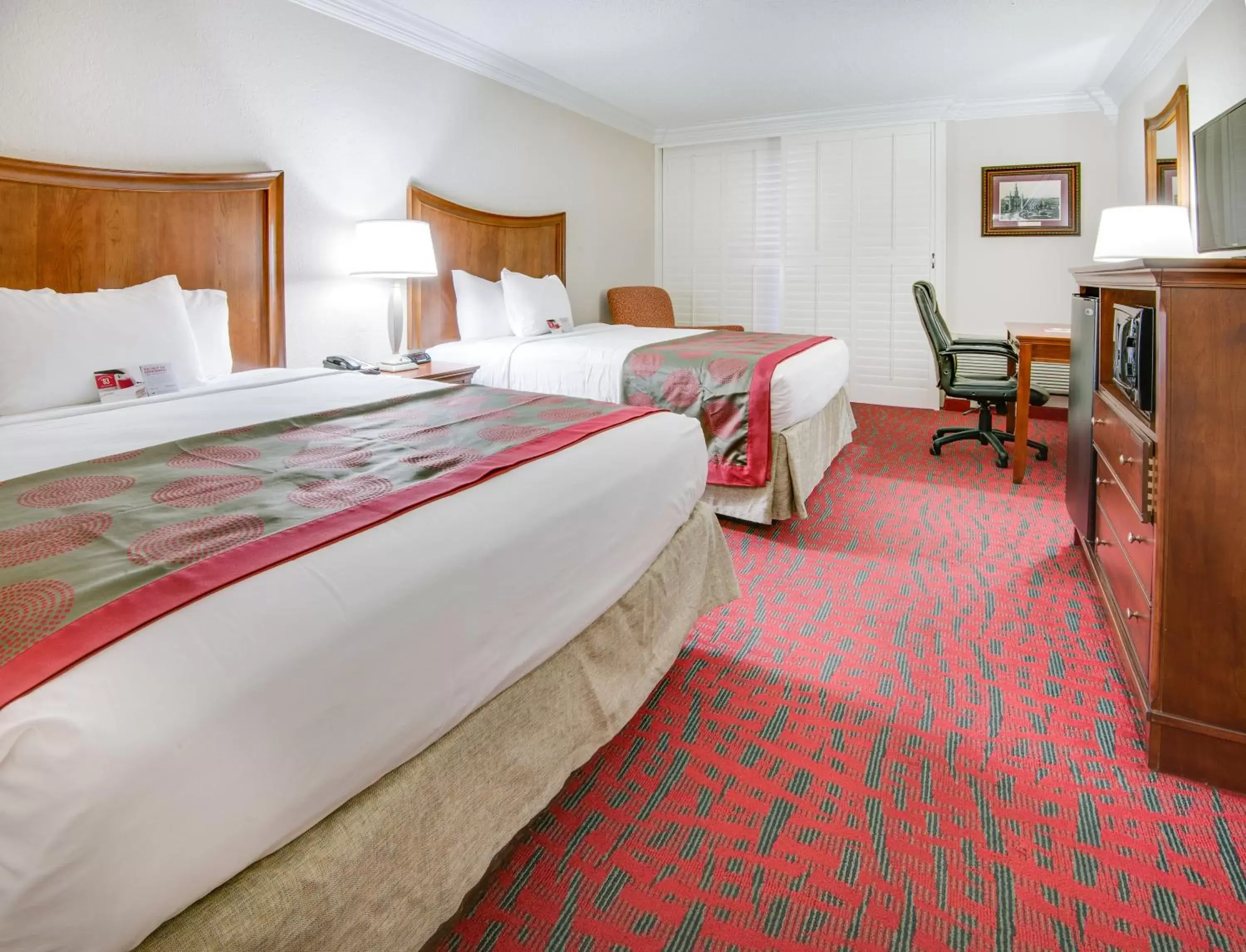 Photo of the whole room, Bed in Ramada by Wyndham Metairie New Orleans Airport