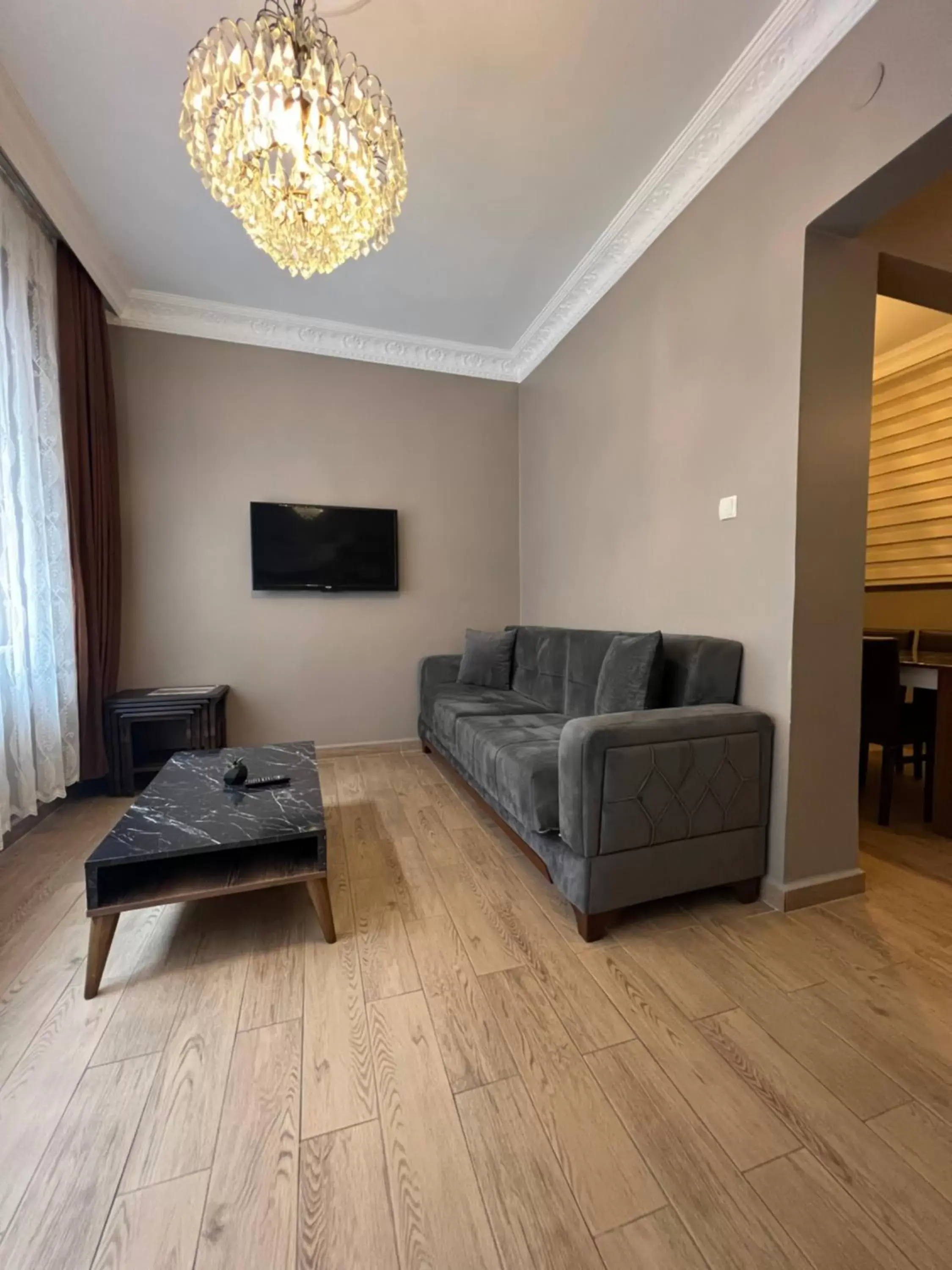 Living room, Seating Area in Zendy Suite Hotel