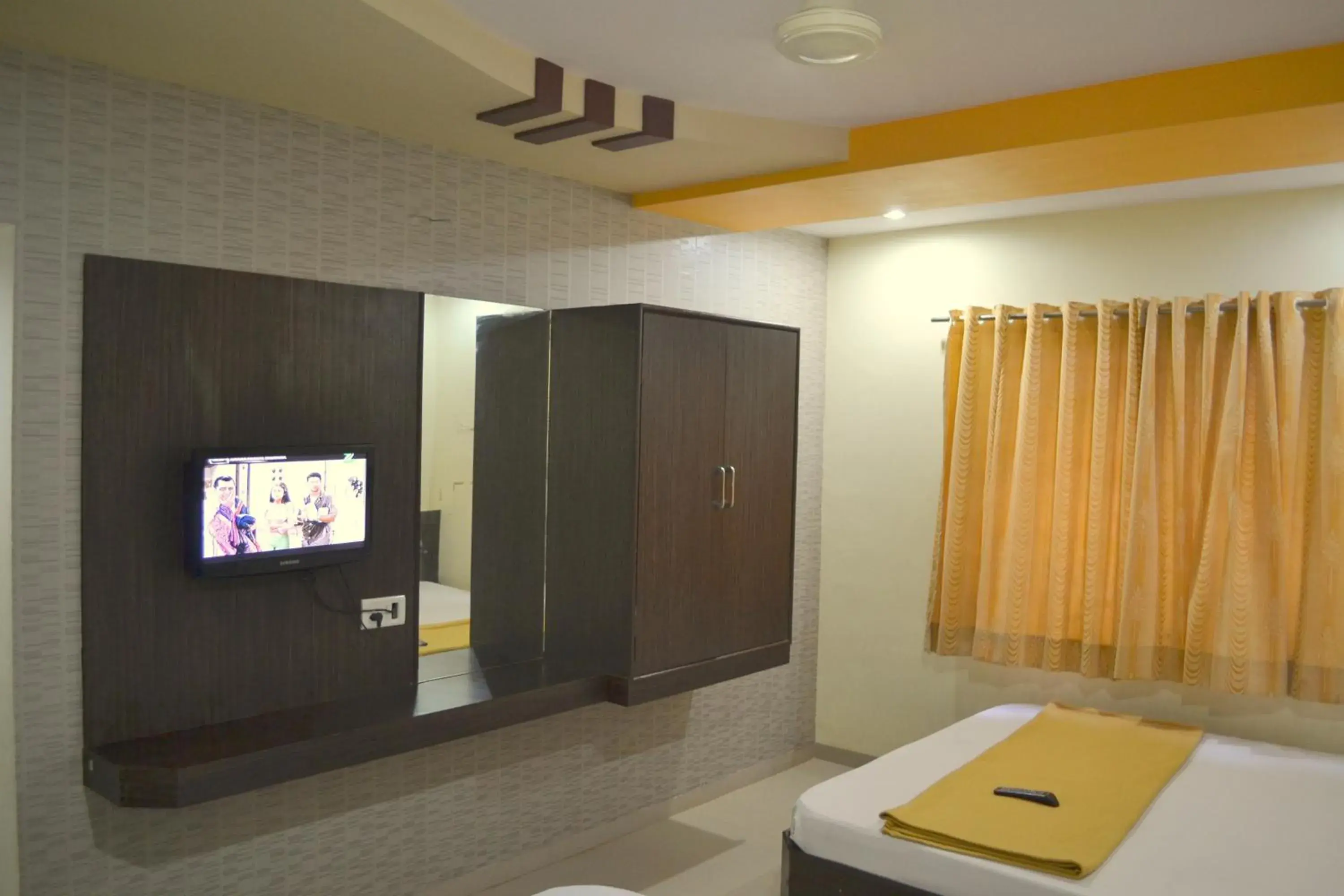 TV and multimedia, TV/Entertainment Center in Hotel Sai Kamal