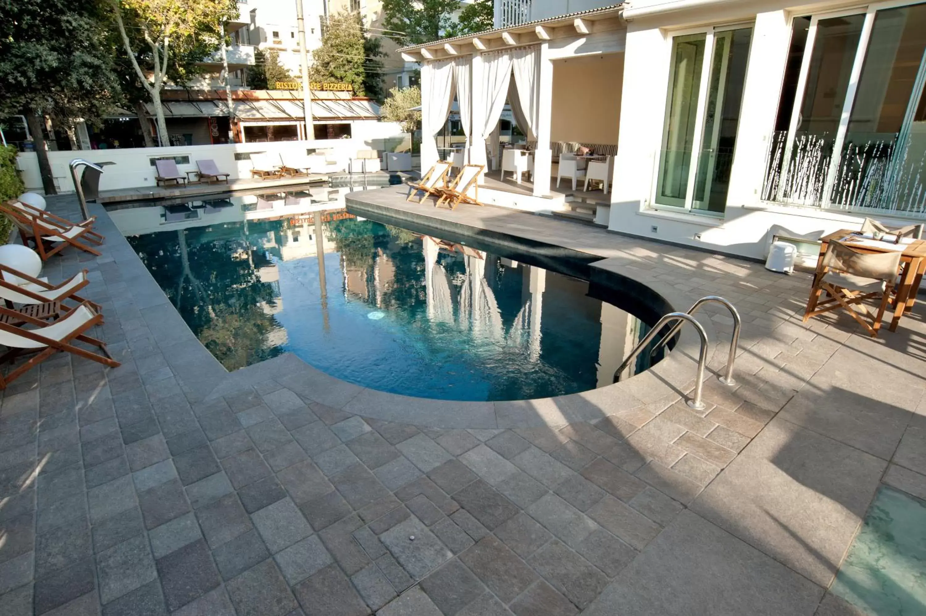 Swimming Pool in Le Rose Suite Hotel