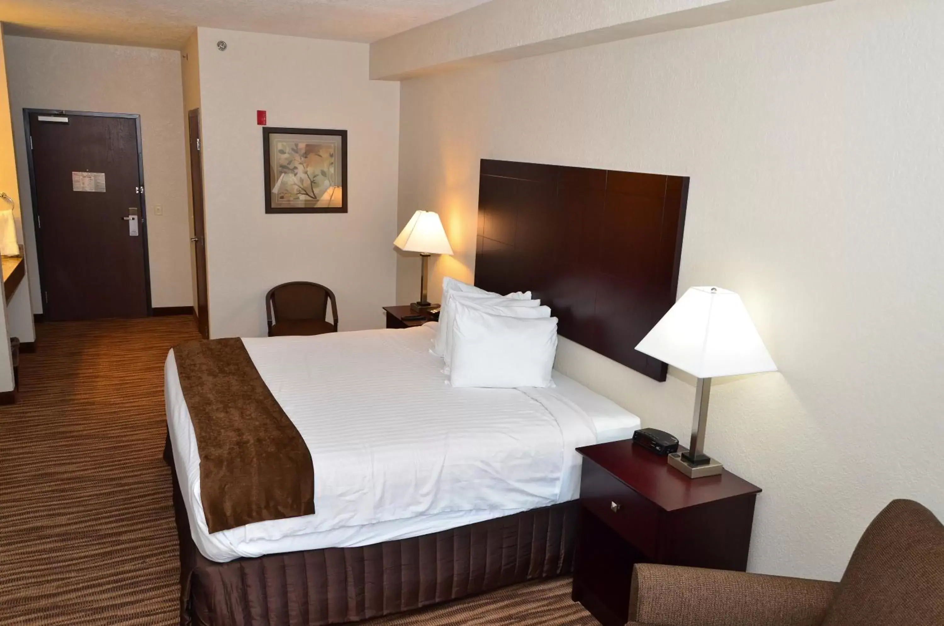 Bed in Cobblestone Inn & Suites - Clarion