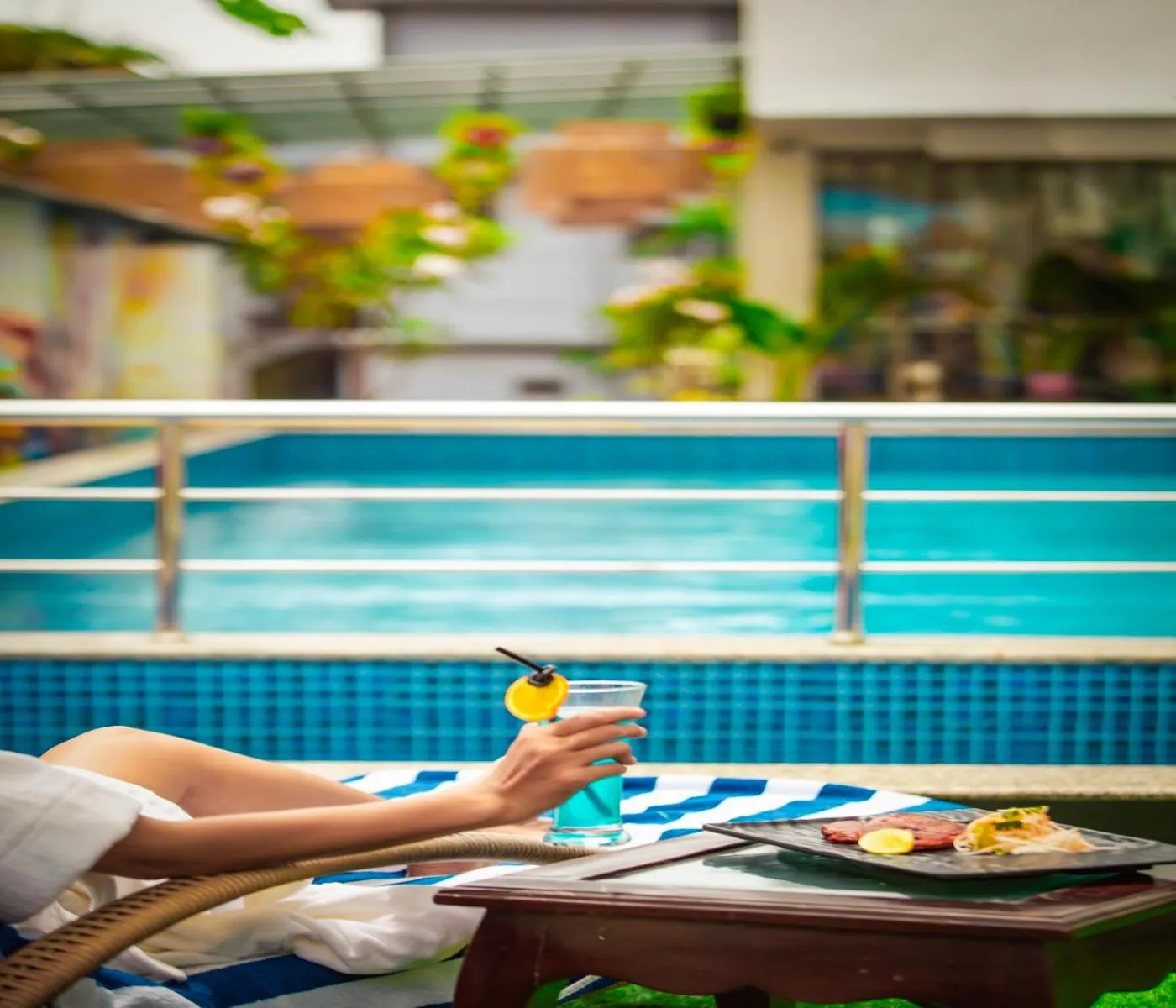 Swimming pool in HUE GUH The Porto Candolim