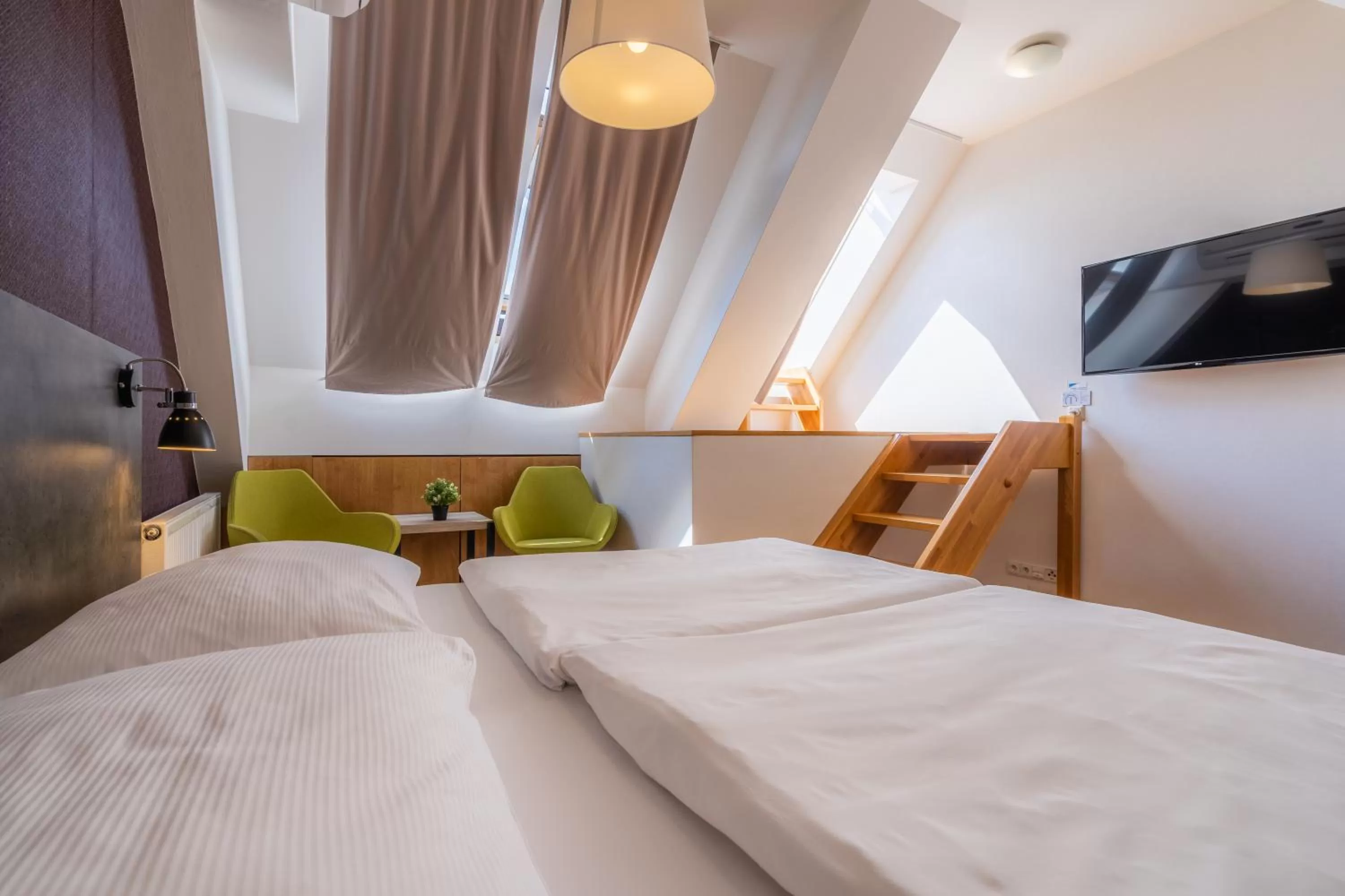 Bed in EA ApartHotel Melantrich